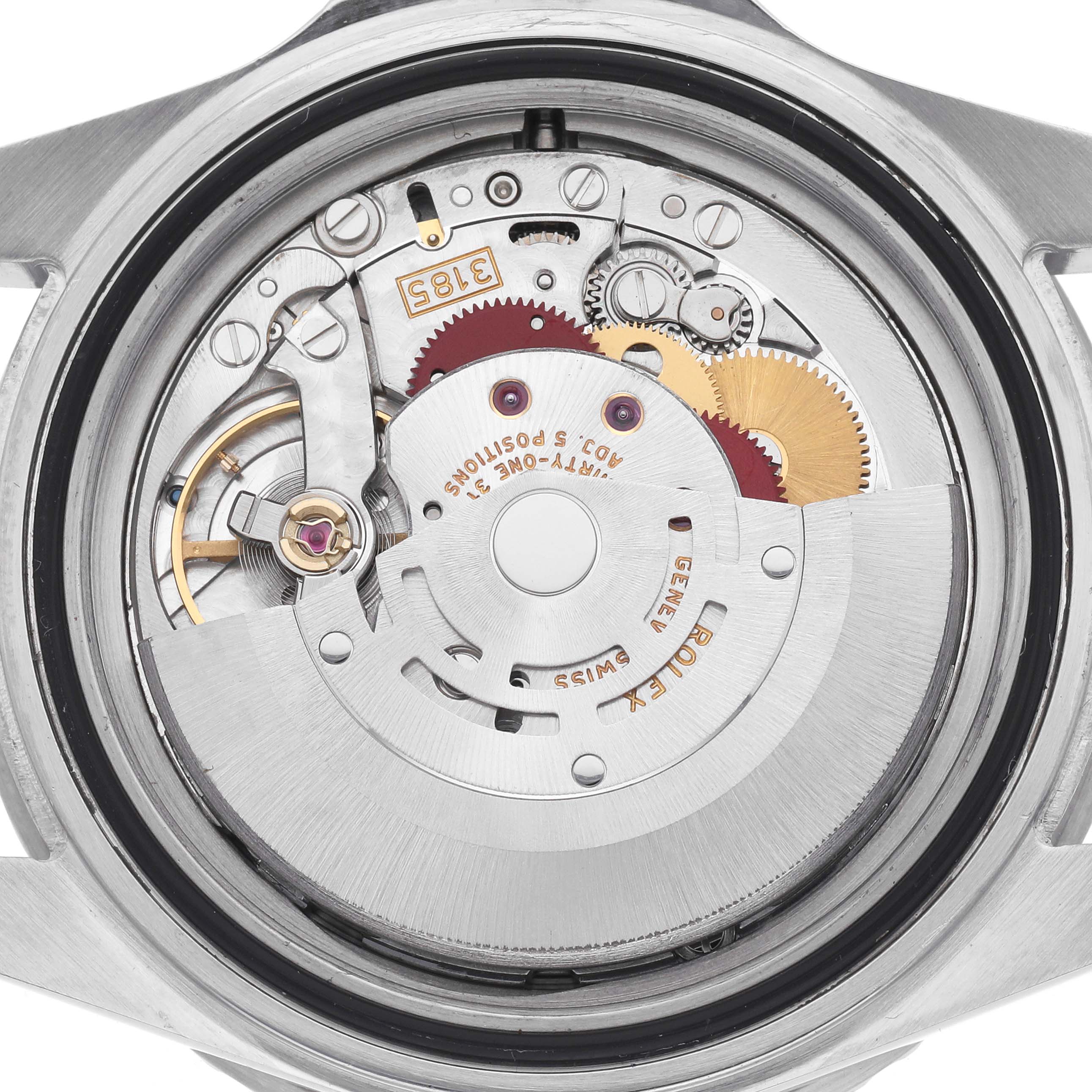 The image shows the movement from the back view of a Rolex GMT-Master 16710 Men's Stainless Steel Black Dial 16710 Men's Stainless Steel Black Dial, highlighting gears and intricate components.