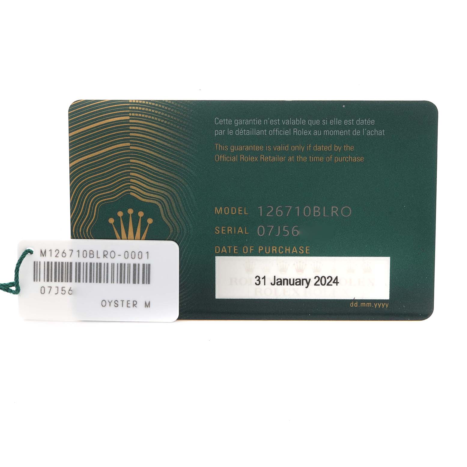 The image shows a Rolex GMT-Master 126710BLRO Men's Stainless Steel Black Dial 126710BLRO Men's Stainless Steel Black Dial warranty card and a tag, displaying model and serial numbers.