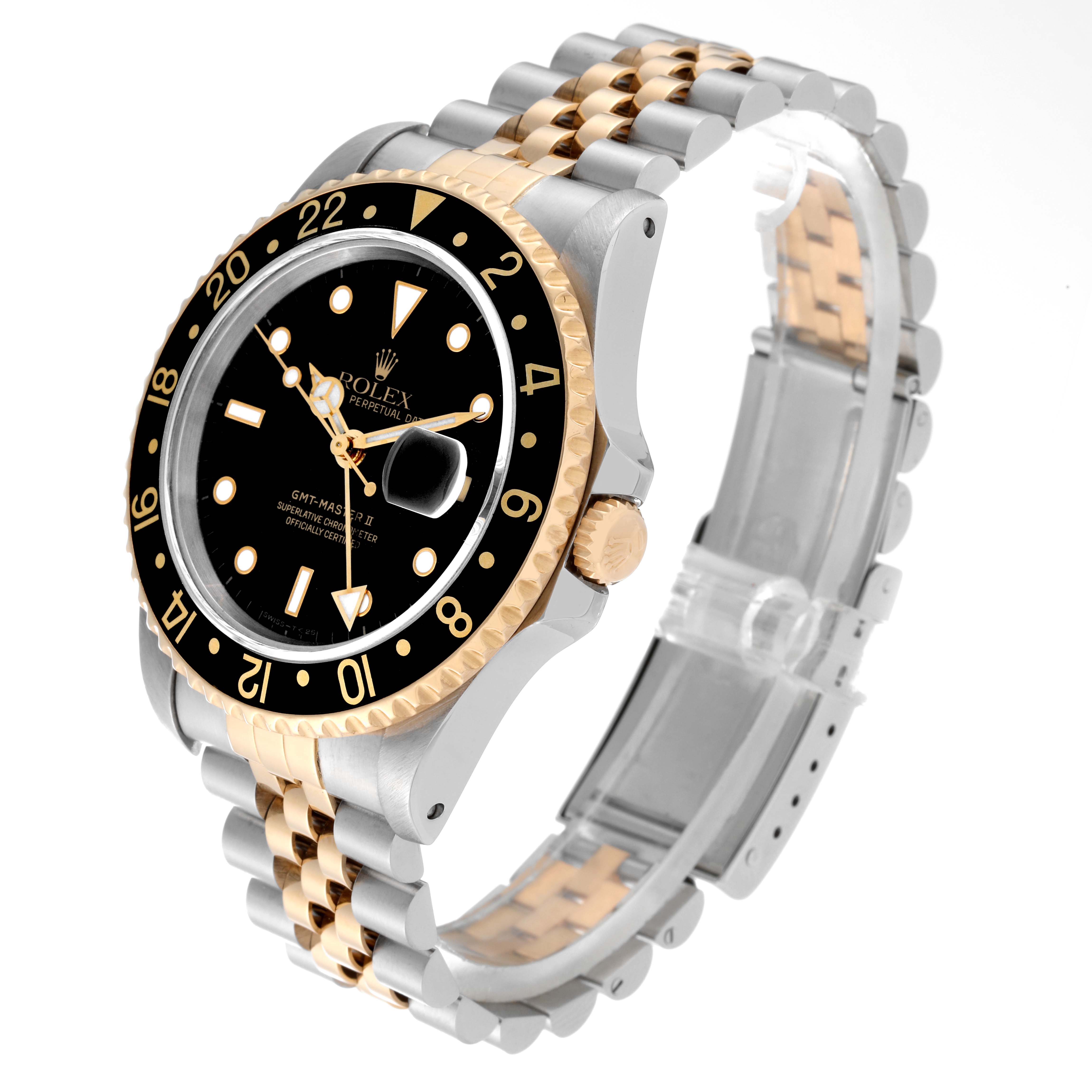 The Rolex GMT-Master 16713 Men's Steel and Gold (two tone) Black Dial 16713 Men's Steel and Gold (two tone) Black Dial watch is shown at an angled side view, highlighting its two-tone bracelet, bezel, and crown.