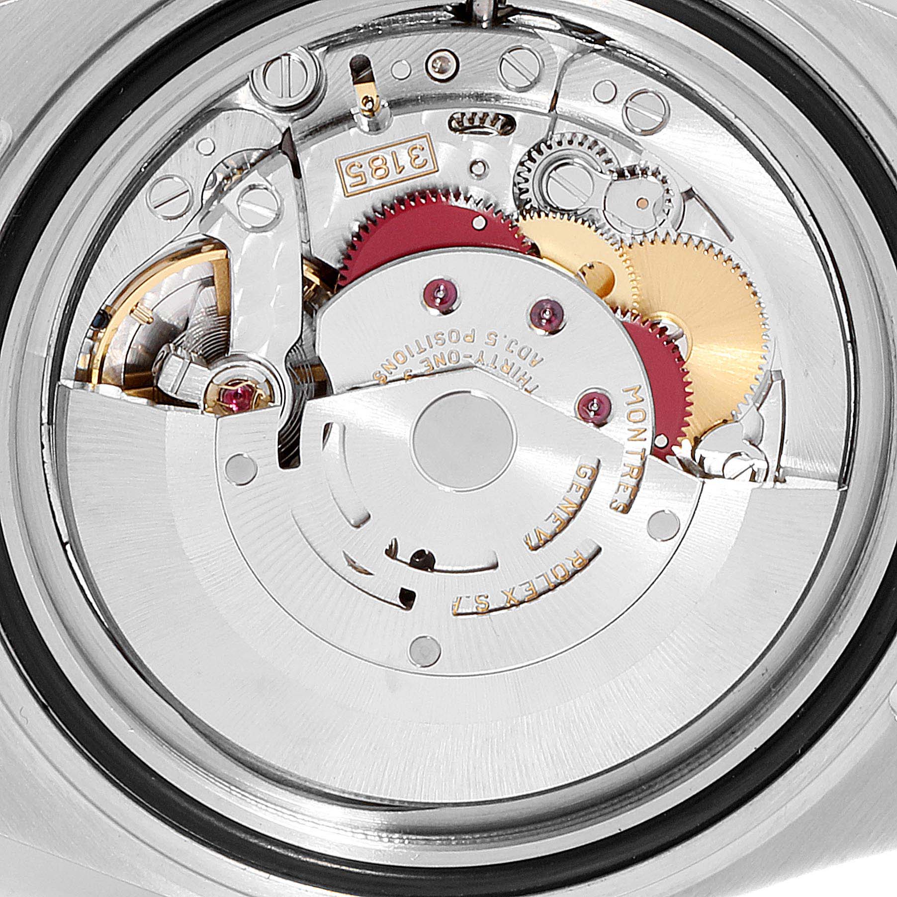 This image shows the movement and inner workings of a Rolex GMT-Master 16713 Men's Steel and Gold (two tone) Black Dial 16713 Men's Steel and Gold (two tone) Black Dial watch, viewed from the back with various gears and components visible.