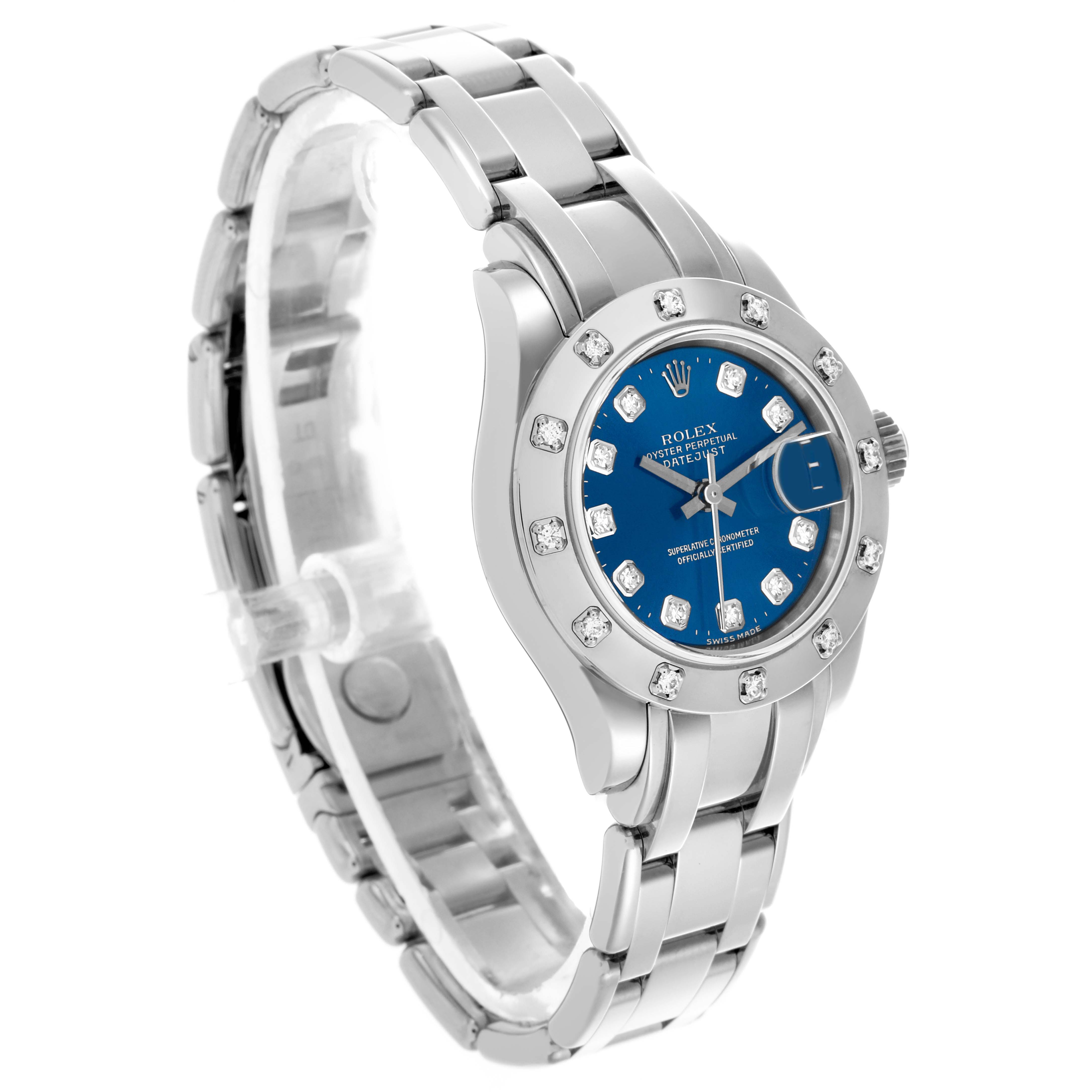 The Rolex Pearlmaster 80319 Women
s White Gold Blue Dial 80319 Women
s White Gold Blue Dial watch is shown at an angle displaying its bracelet, bezel, blue dial, and diamond hour markers.