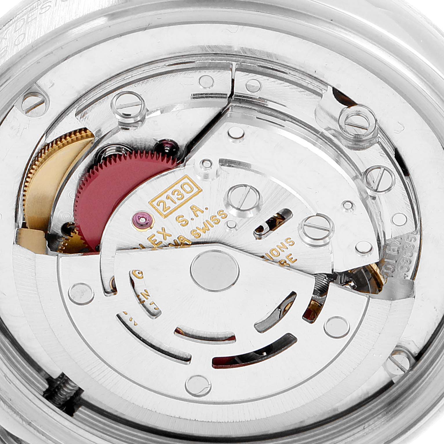 This image shows the internal mechanism of a Rolex Mid-Size 67480 Women's Stainless Steel Pink Dial 67480 Women's Stainless Steel Pink Dial watch, specifically the movement and gears.