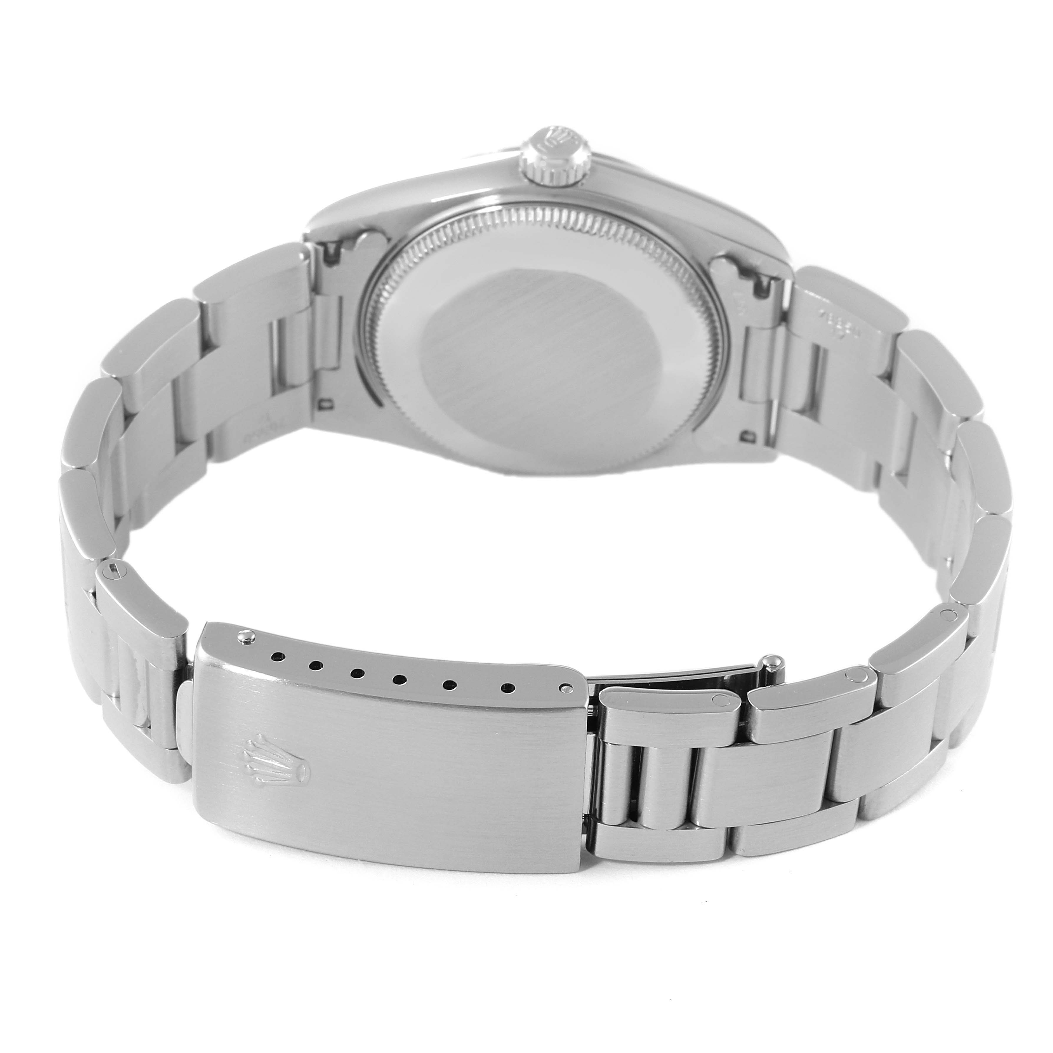 This image shows the back view of a Mid-Size Rolex watch, highlighting the bracelet, case back, and clasp.