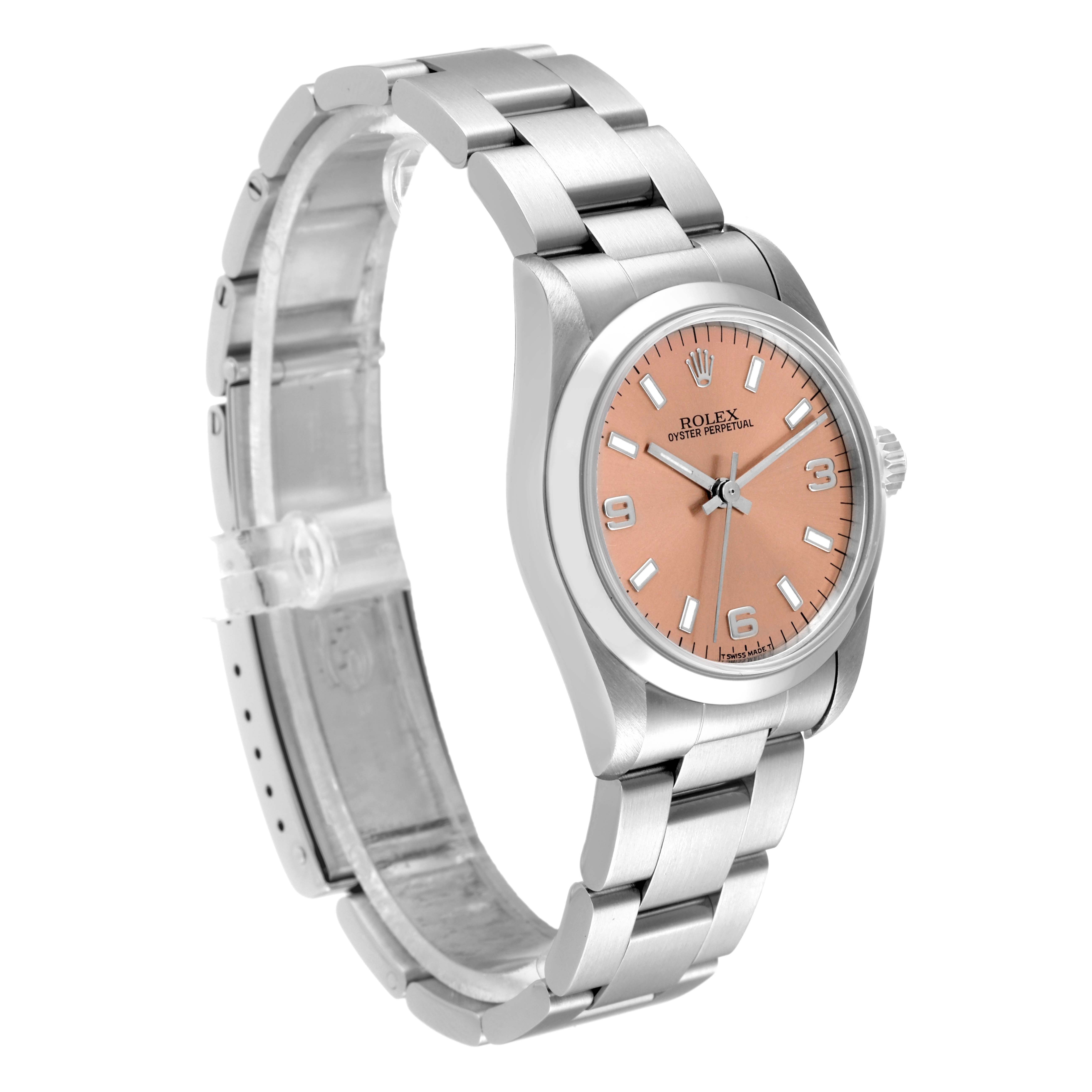 This Rolex Mid-Size 67480 Women's Stainless Steel Pink Dial 67480 Women's Stainless Steel Pink Dial watch is shown from a front-left angle, highlighting its pink dial, case, and bracelet.