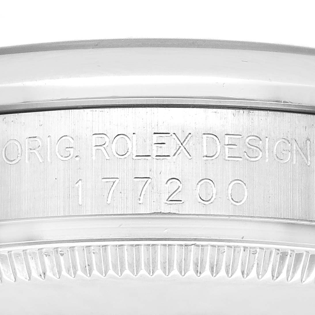 This image shows a close-up of the case side of a Rolex Mid-Size 177200 Women's Stainless Steel Black Dial 177200 Women's Stainless Steel Black Dial model 177200, emphasizing the "ORIG. ROLEX DESIGN" engraving.