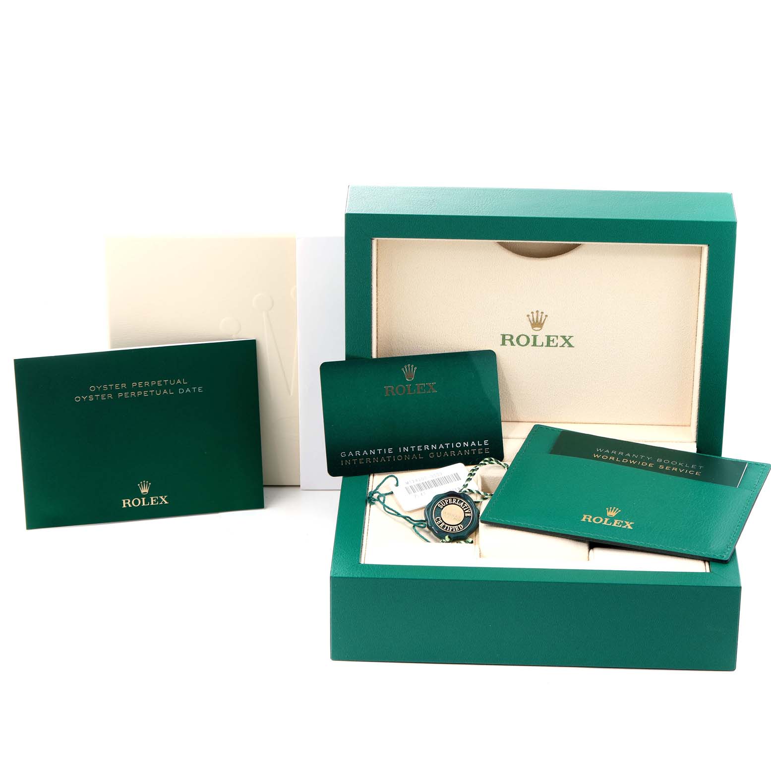The image shows the packaging and accessories for a Rolex Oyster Perpetual 124200 Men
s Stainless Steel Black Dial 124200 Men
s Stainless Steel Black Dial, including the box, warranty cards, and booklets.