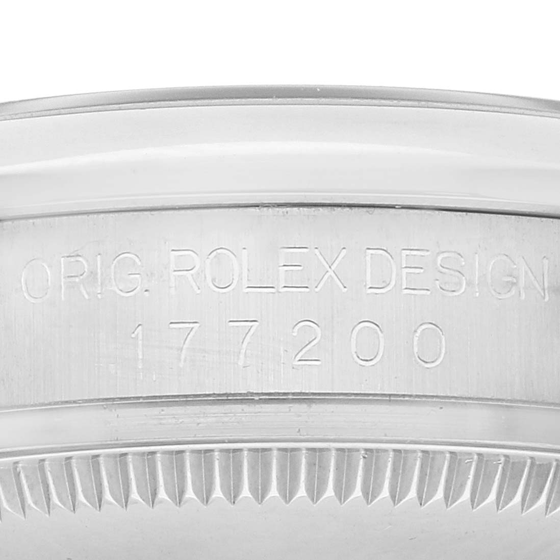 The image shows the side view of a Rolex Mid-Size 177200 Women's Stainless Steel Grey Dial 177200 Women's Stainless Steel Grey Dial watch case, displaying the model number and "ORIG. ROLEX DESIGN" engraving.