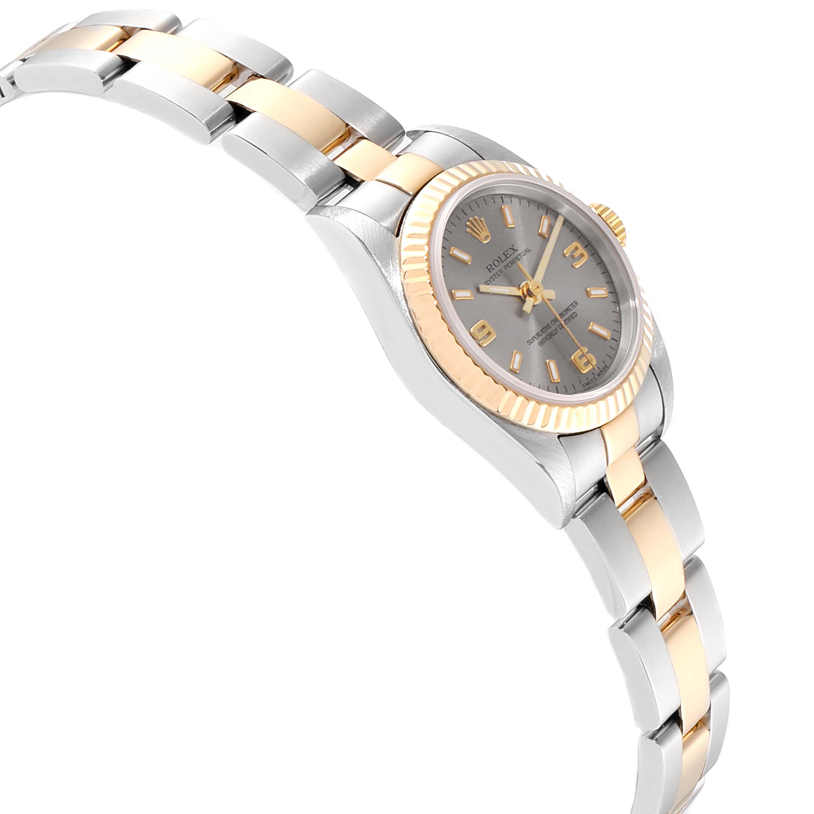 The image shows a side view of a Rolex Oyster Perpetual 76193 Women's Stainless Steel Grey Dial 76193 Women's Stainless Steel Grey Dial watch with a two-tone metal band and a fluted bezel.