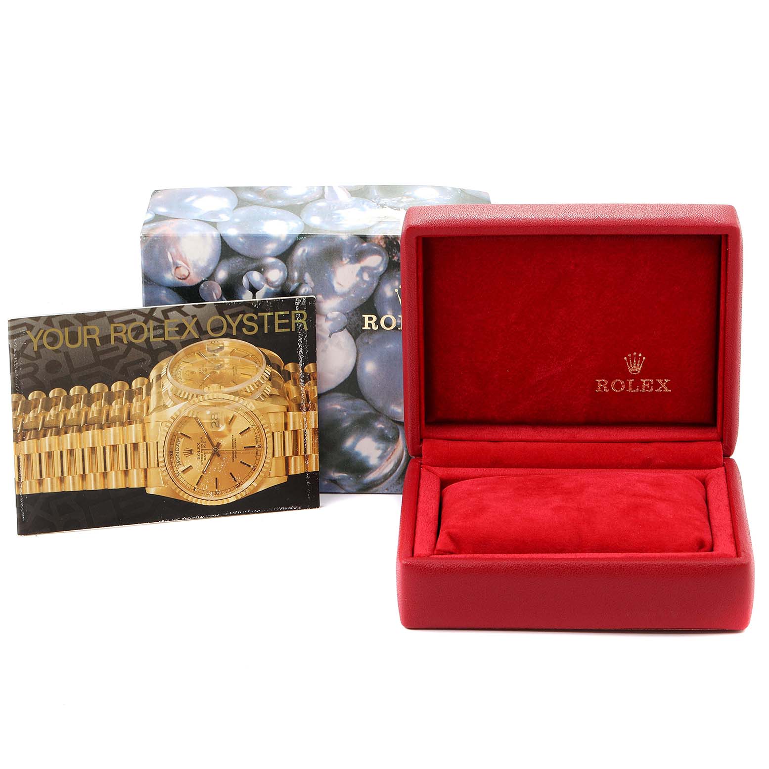 The image shows the packaging box and an open empty case for the Rolex Oyster Perpetual 76193 Women's Stainless Steel Grey Dial 76193 Women's Stainless Steel Grey Dial model, along with a booklet.