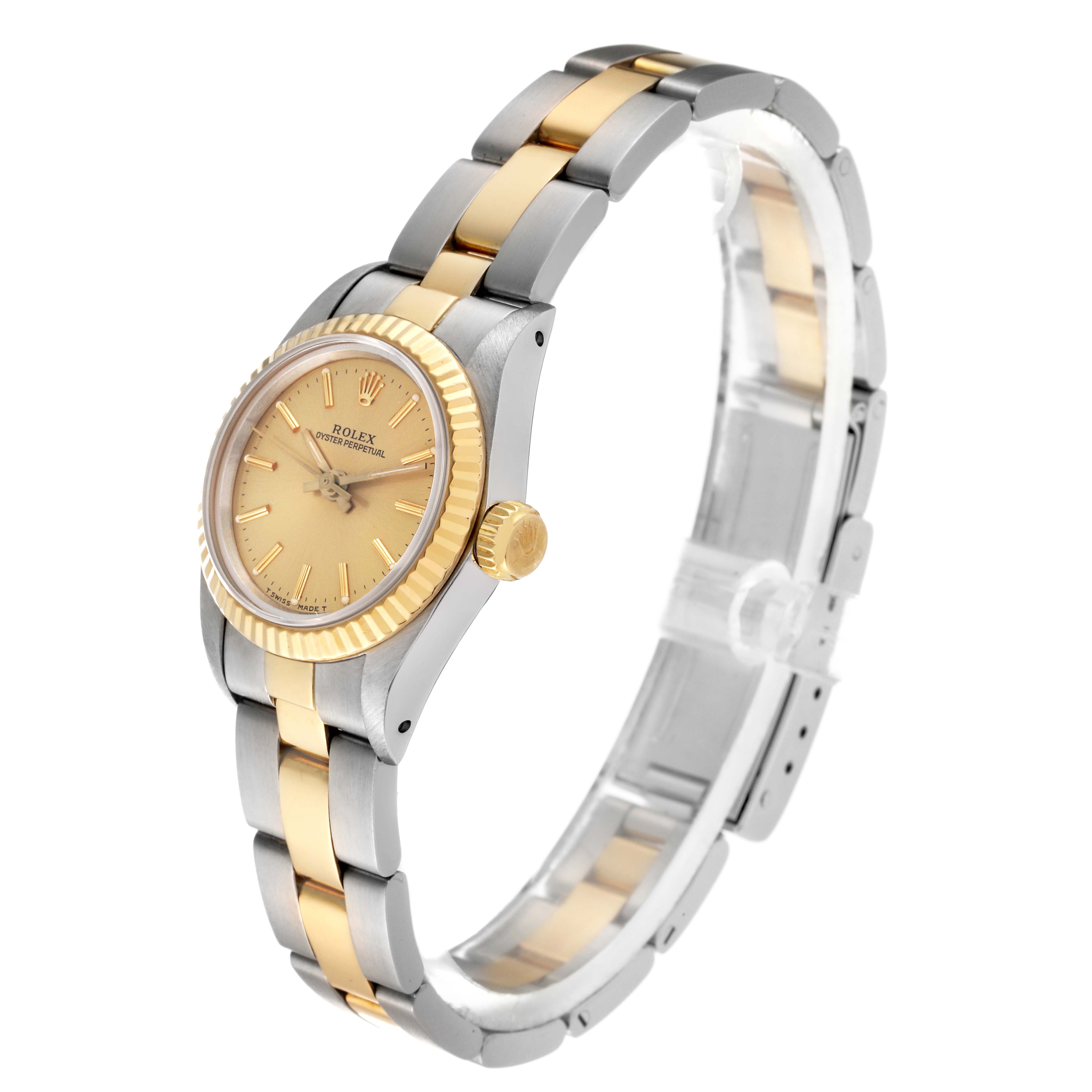 The Rolex Oyster Perpetual 67193 Women's Steel and Gold (two tone) Champagne Dial 67193 Women's Steel and Gold (two tone) Champagne Dial watch is shown at a side angle highlighting its two-tone bracelet and gold bezel.