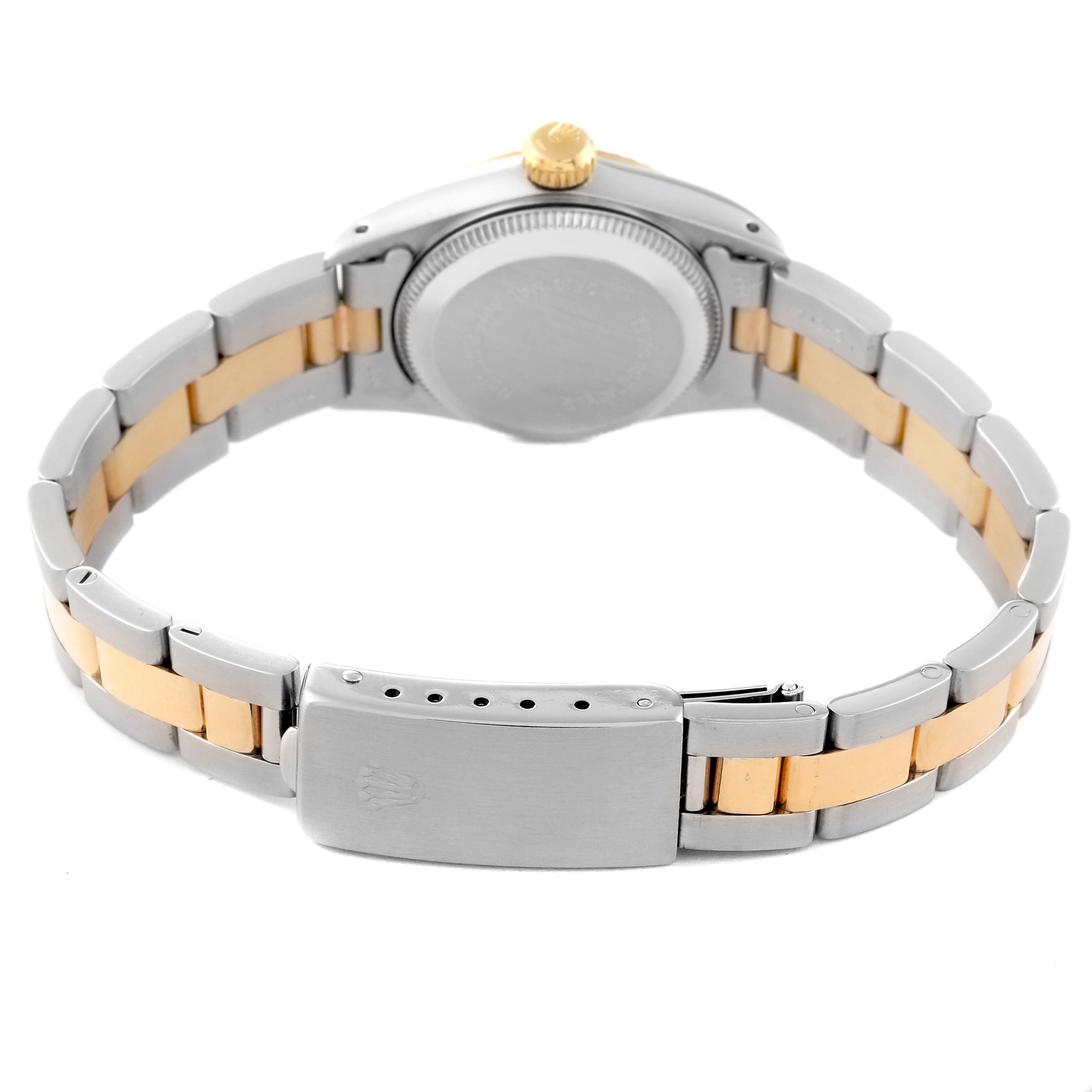 This image shows the backside and bracelet of a Rolex Oyster Perpetual 67193 Women's Steel and Gold (two tone) Champagne Dial 67193 Women's Steel and Gold (two tone) Champagne Dial watch, highlighting the clasp and case back.