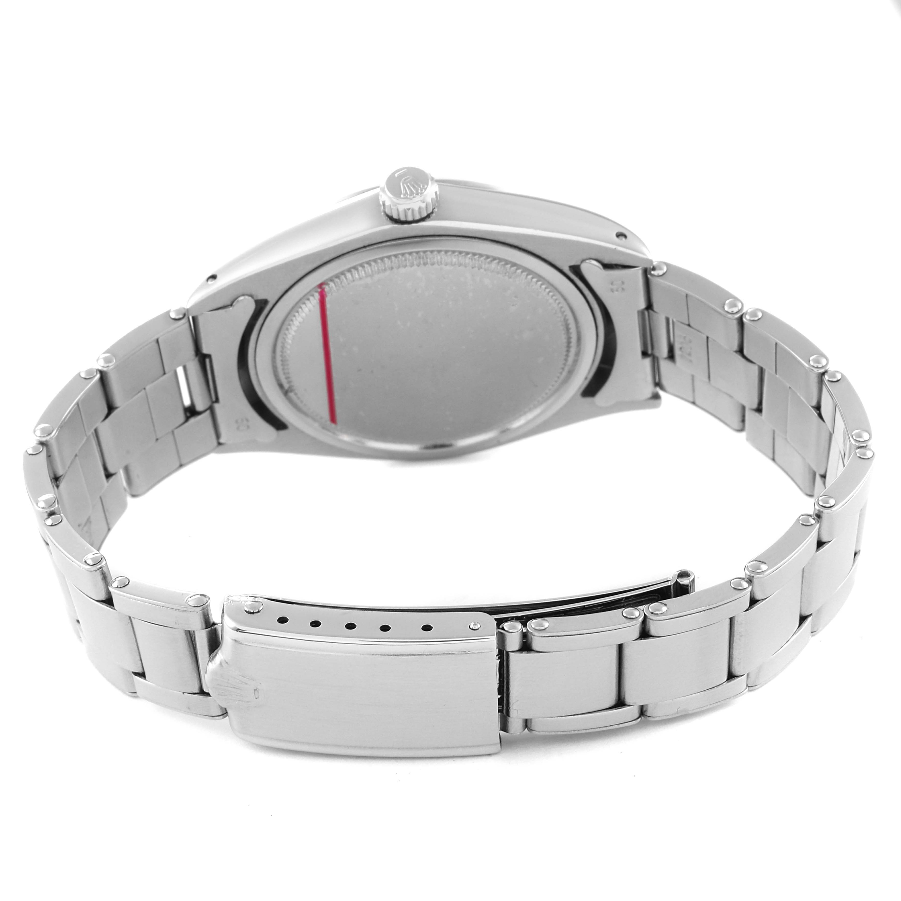 The image shows the back and clasp of a Rolex Vintage Collection 6694 Men's Stainless Steel Silver Dial 6694 Men's Stainless Steel Silver Dial model watch.