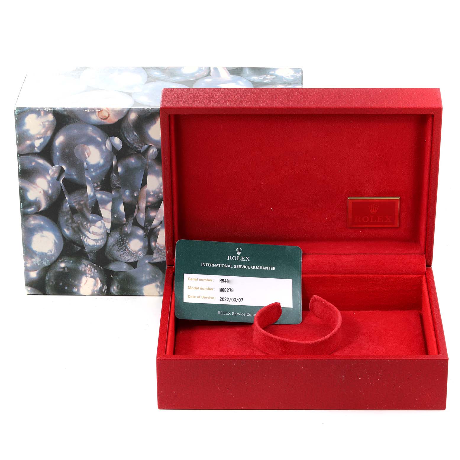 The image shows the packaging and guarantee card for a Rolex President 68279 Women's White Gold White Dial 68279 Women's White Gold White Dial model watch, including a red watch box and outer packaging.