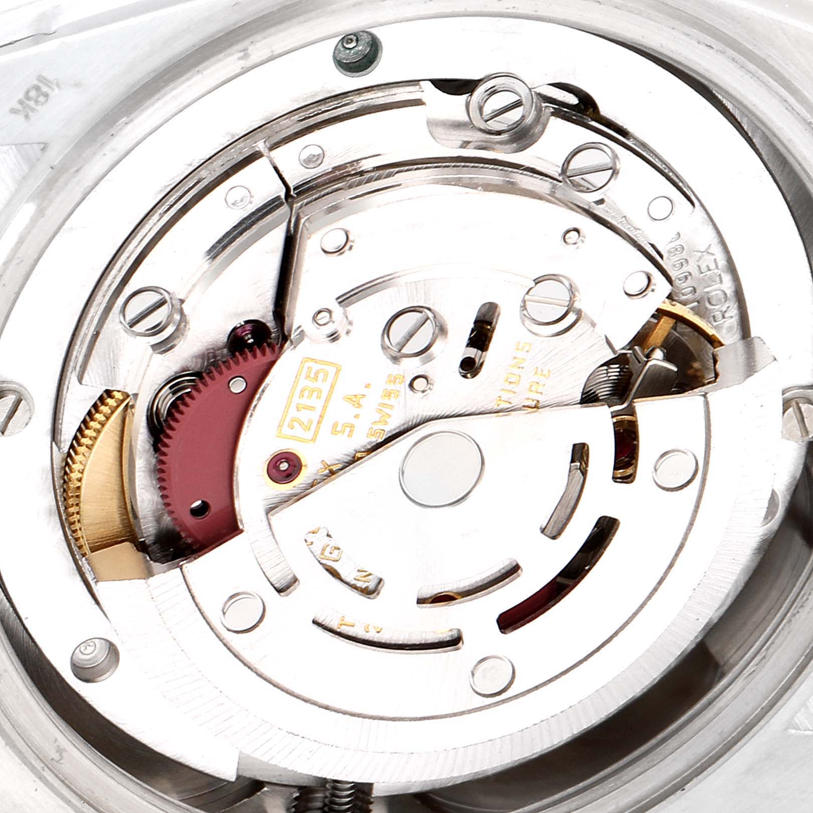 The image shows the internal mechanism of a President model Rolex watch, captured from a top-down angle.