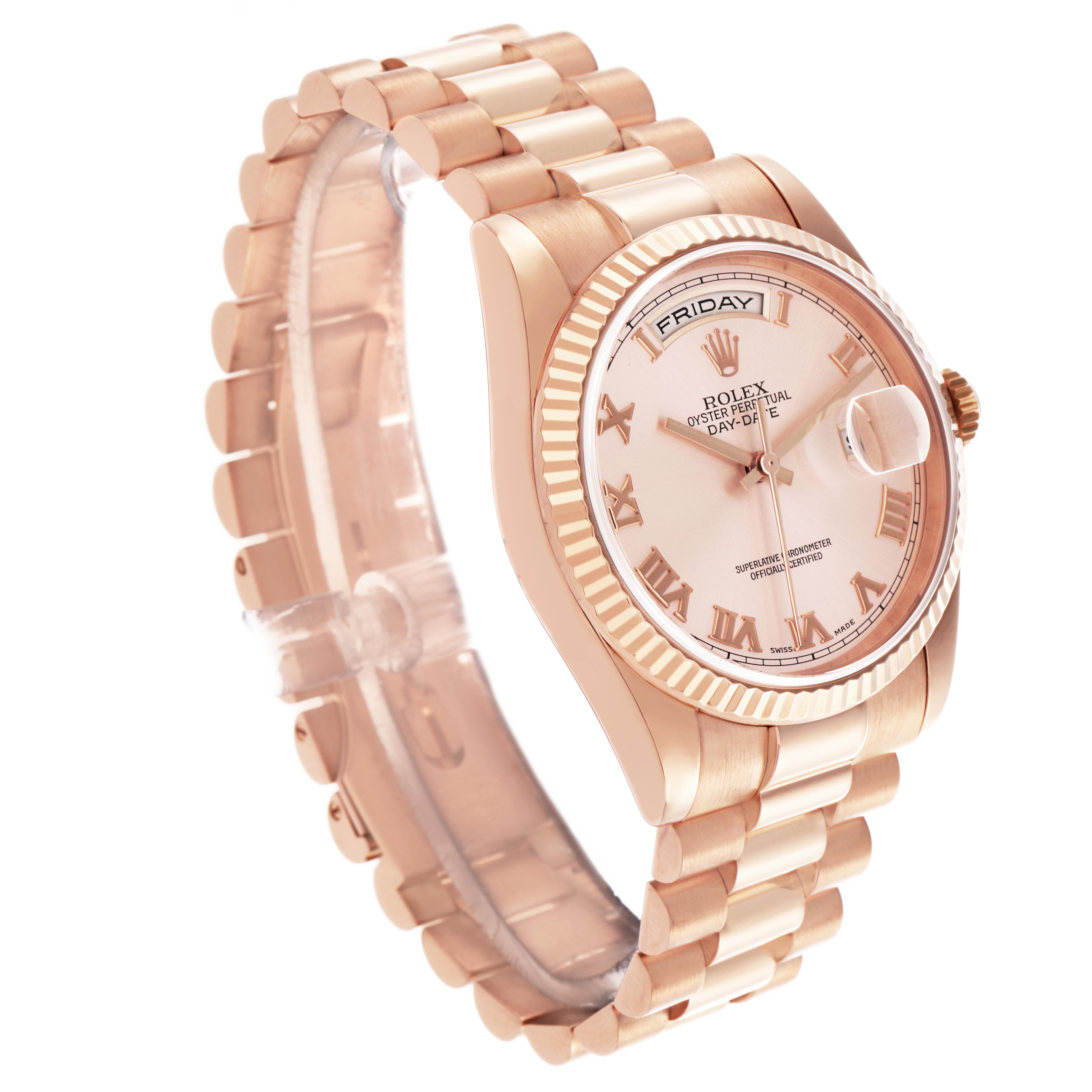 The Rolex President 118235 Men's Rose Gold Pink Dial 118235 Men's Rose Gold Pink Dial model is shown at a 3/4 angle, displaying the watch face, bracelet, crown, and fluted bezel.