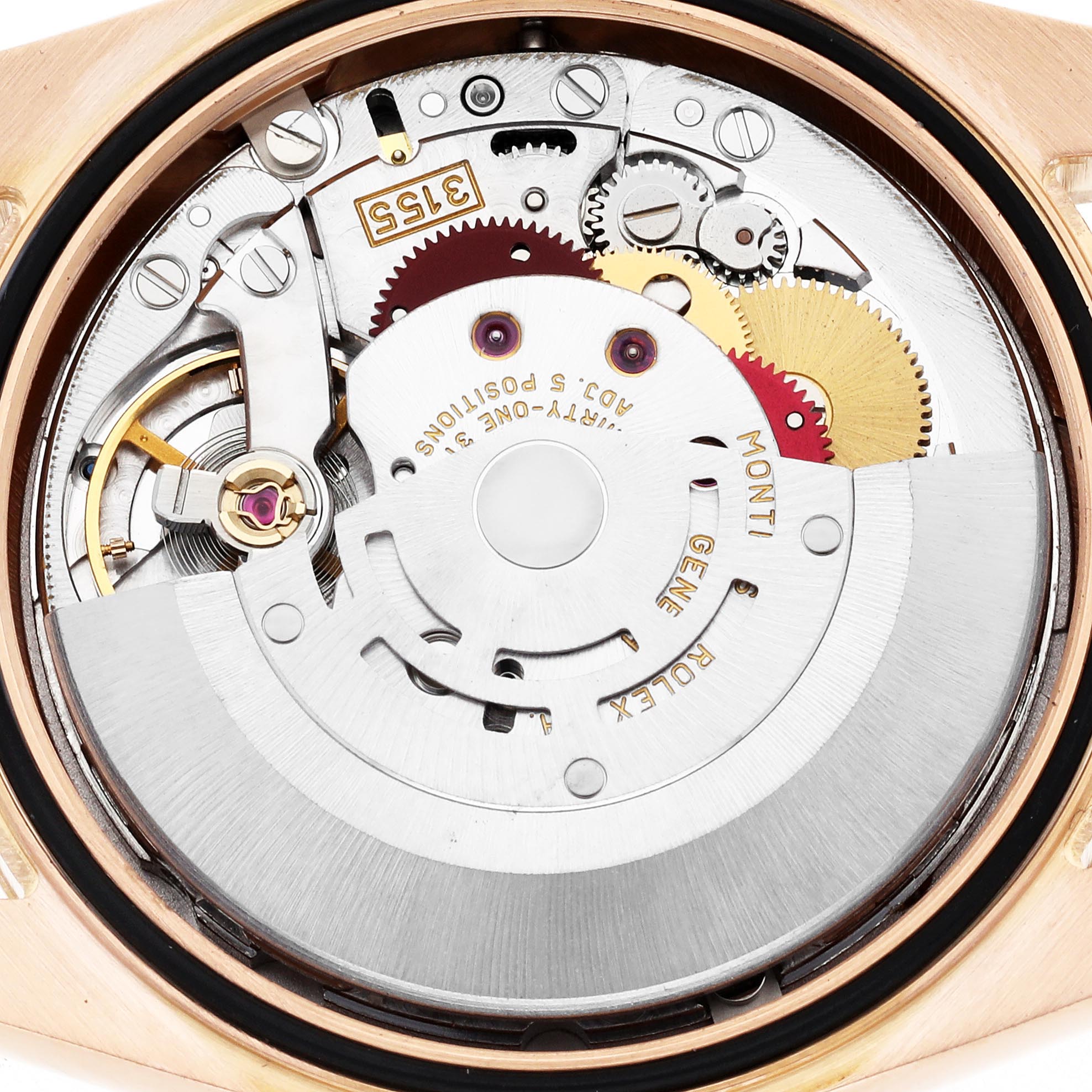 The image shows a close-up of the Rolex President 118235 Men's Rose Gold Pink Dial 118235 Men's Rose Gold Pink Dial model's movement, highlighting gears and inscriptions from the back.