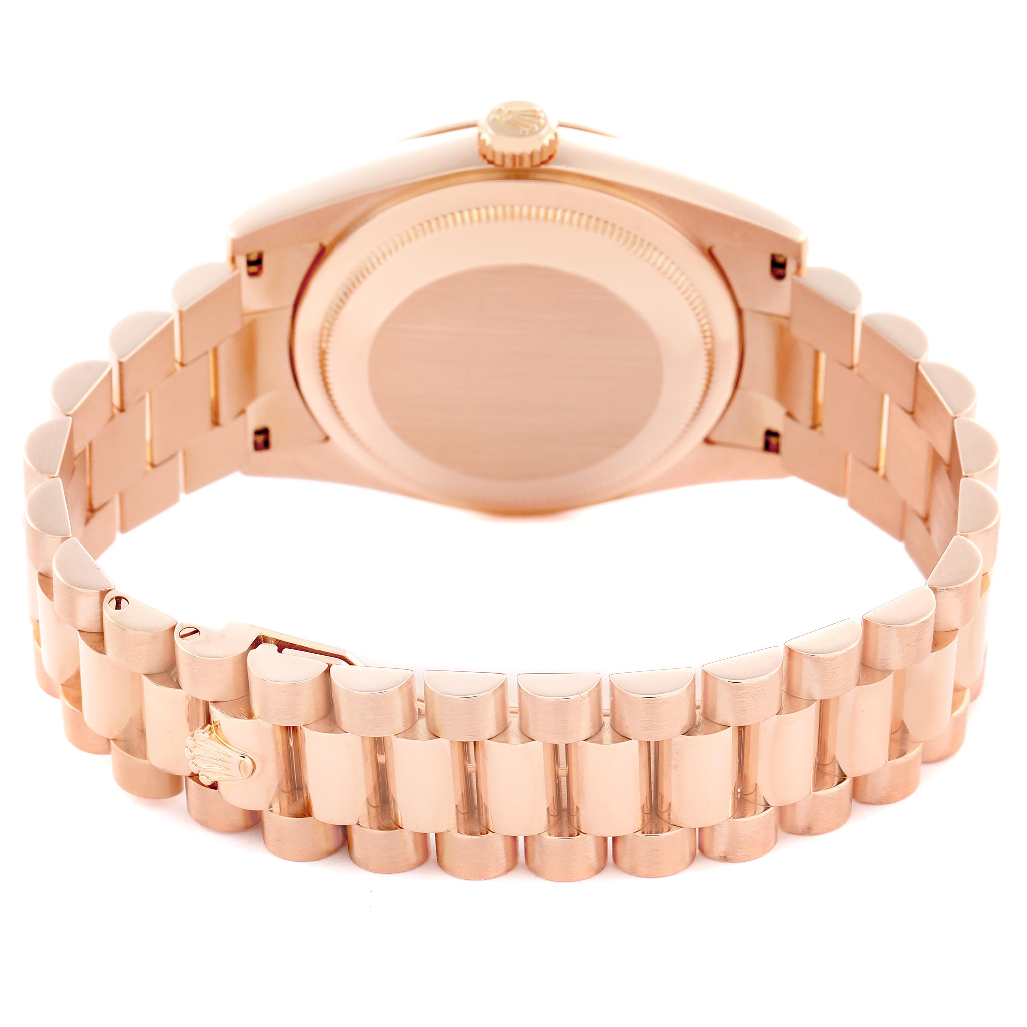 The image shows the back of a Rolex President 118235 Men's Rose Gold Pink Dial 118235 Men's Rose Gold Pink Dial model watch, highlighting the case back, crown, and bracelet.