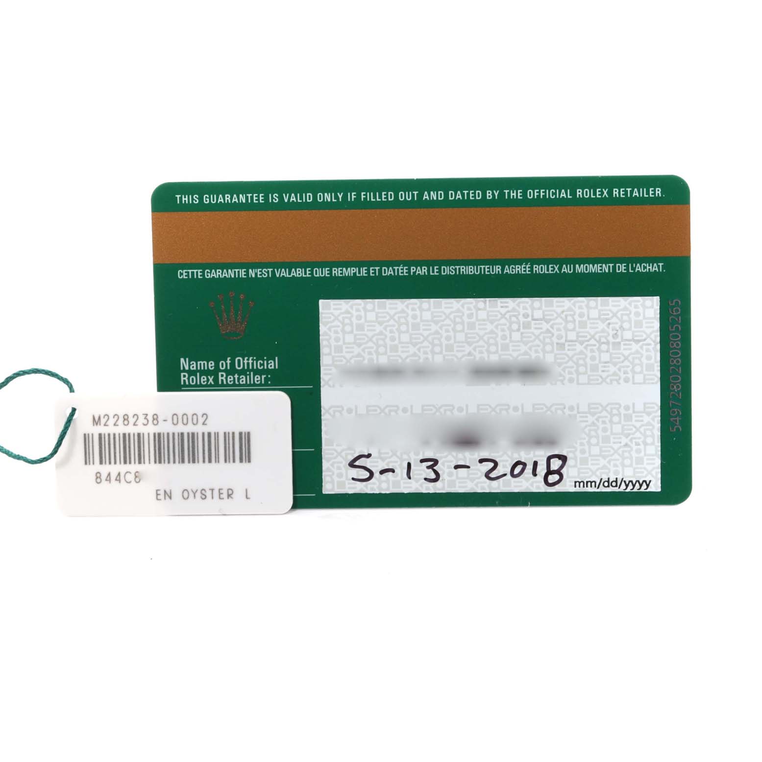 The image shows the warranty card and tag for a Rolex President 228238 Men
s Yellow Gold Silver Dial 228238 Men
s Yellow Gold Silver Dial model watch.