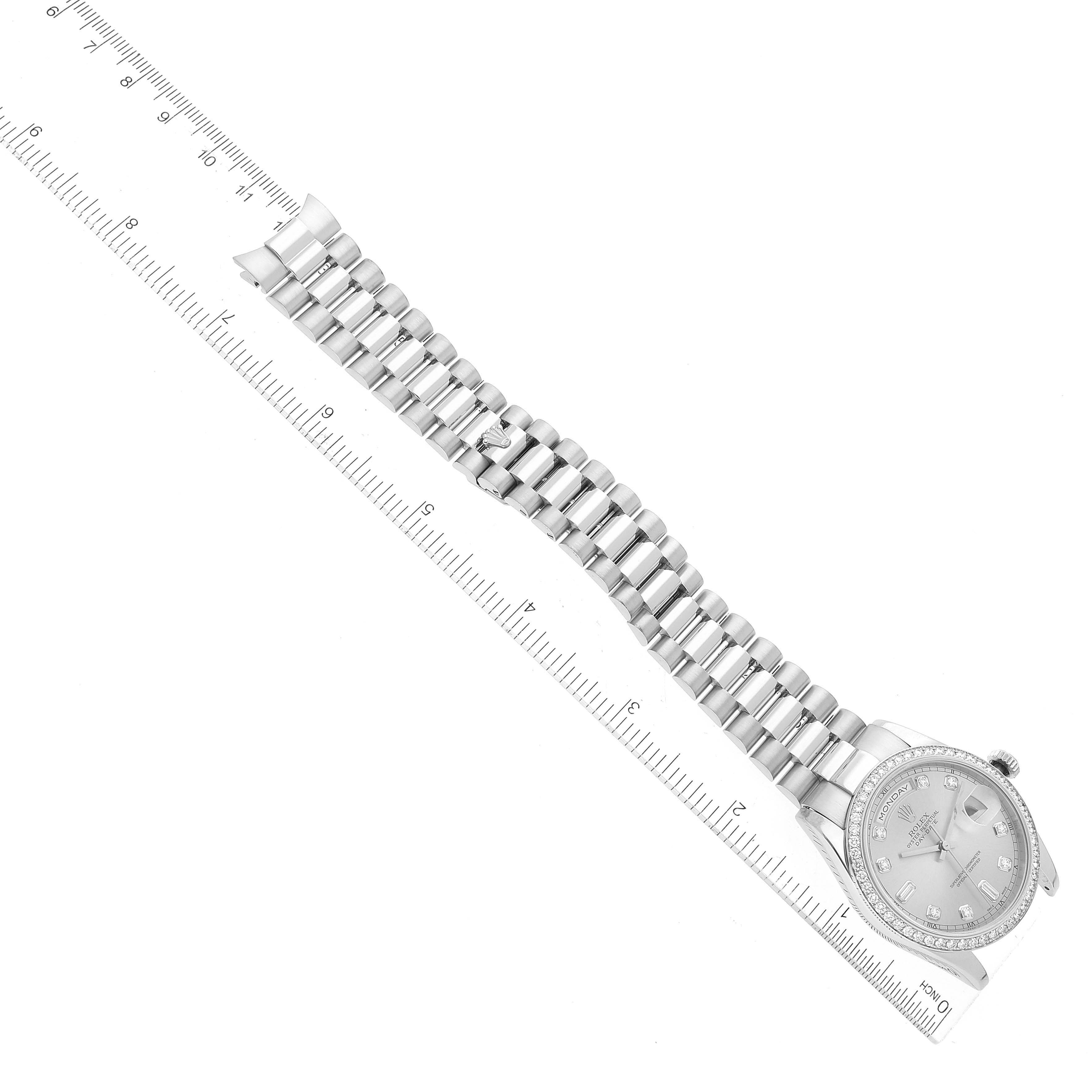 The image shows a Rolex President 118346 Men's Platinum Silver Dial 118346 Men's Platinum Silver Dial model watch laying flat, with its face at the bottom right and the bracelet extended along a ruler.