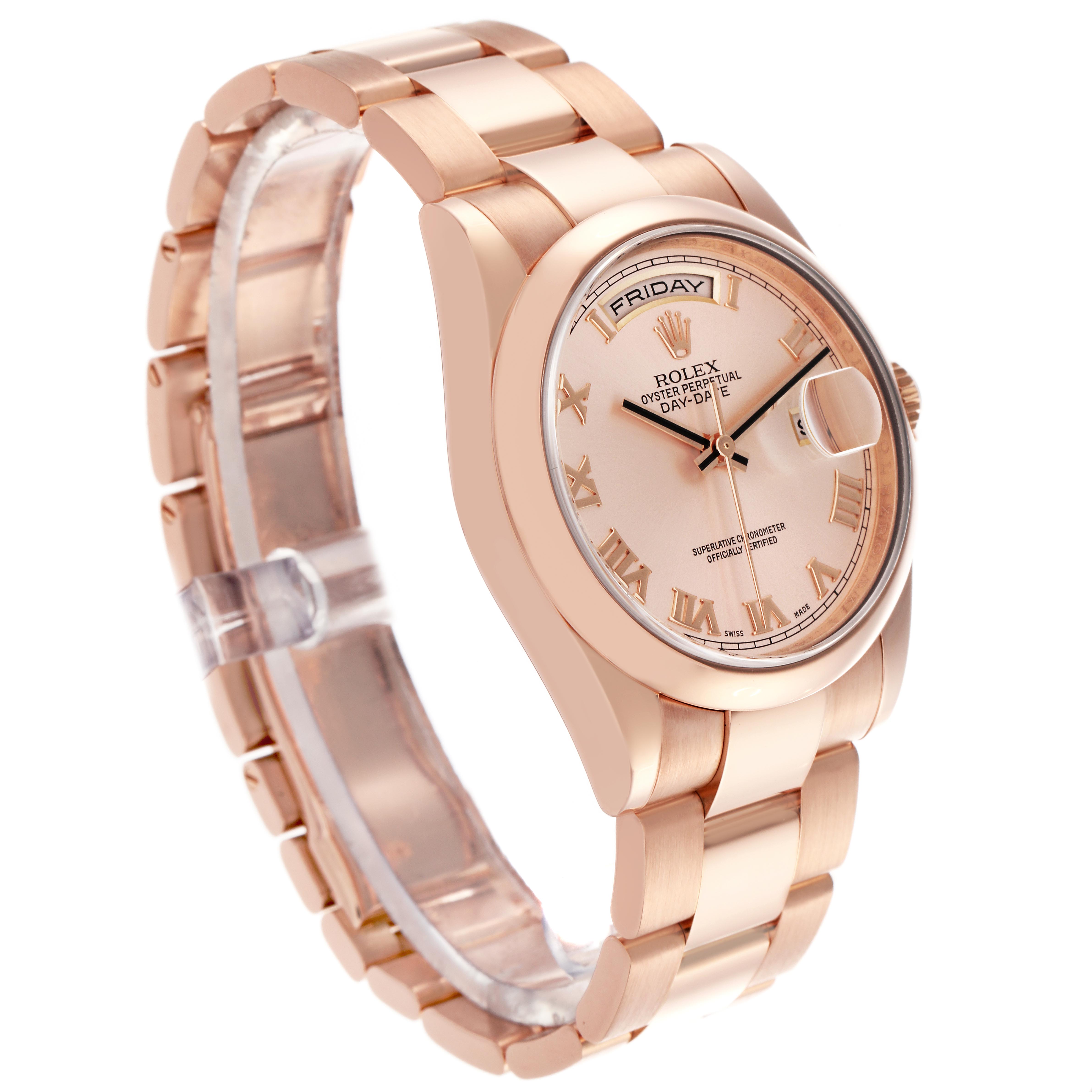 The Rolex President 118205 Men's Rose Gold Pink Dial 118205 Men's Rose Gold Pink Dial model watch is shown at a three-quarter angle, displaying the face, bracelet, and part of the crown.