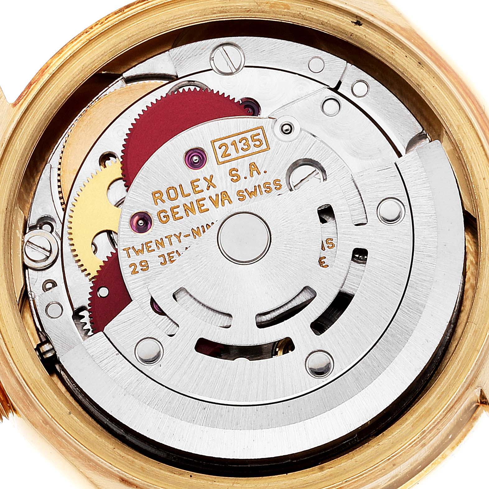The image shows the internal mechanism of a Rolex President 69158 Women's Yellow Gold Mother of Pearl Dial 69158 Women's Yellow Gold Mother of Pearl Dial model watch, highlighting gears and the rotor.