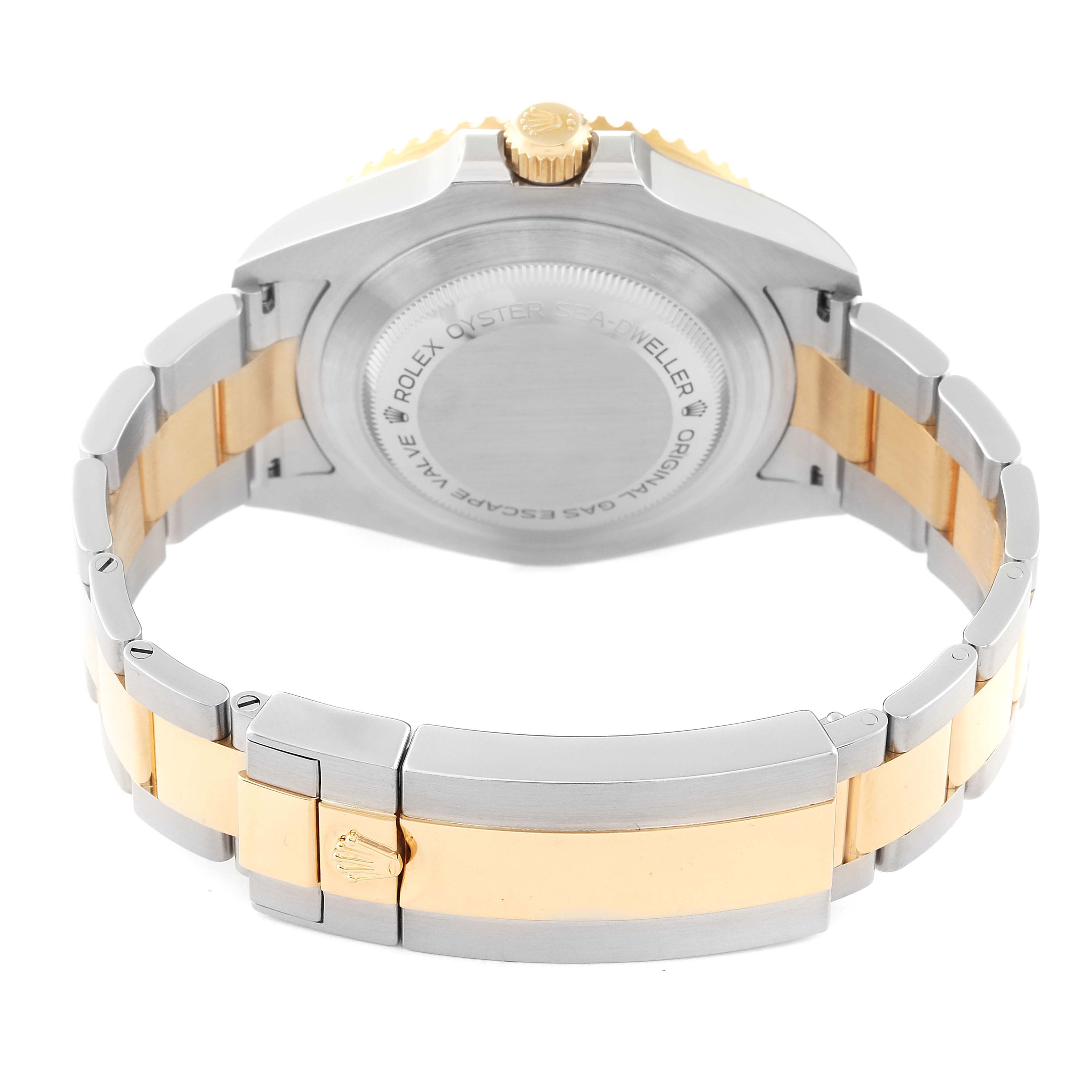 The image shows the back case and bracelet of the Rolex Sea-Dweller 126603 Men's Steel and Gold (two tone) Black Dial 126603 Men's Steel and Gold (two tone) Black Dial watch, emphasizing its two-tone metal design and clasp with the Rolex logo.