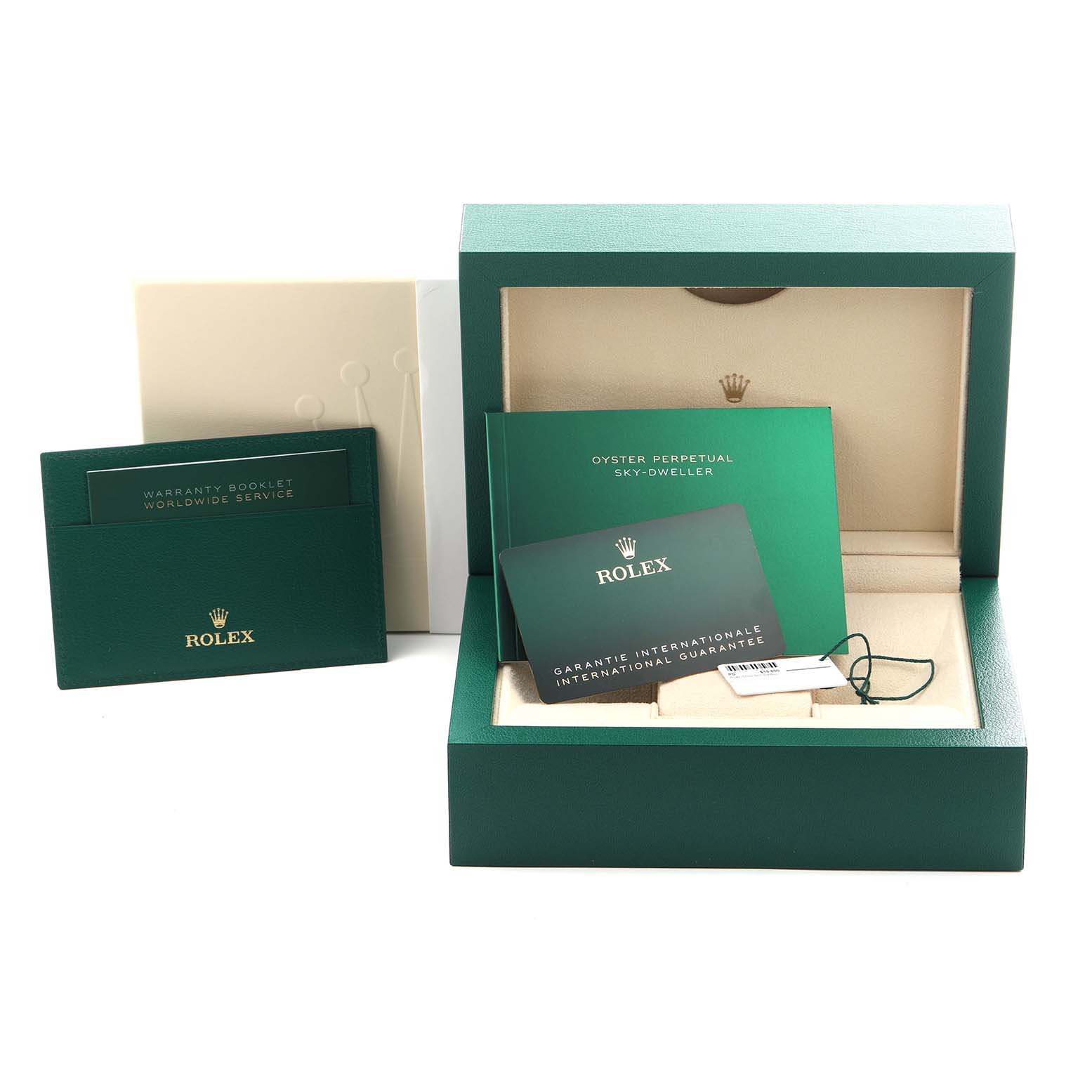 The image shows a Rolex Sky-Dweller 336934 Men's Stainless Steel Green Dial 336934 Men's Stainless Steel Green Dial box and paperwork including a warranty card and booklet.