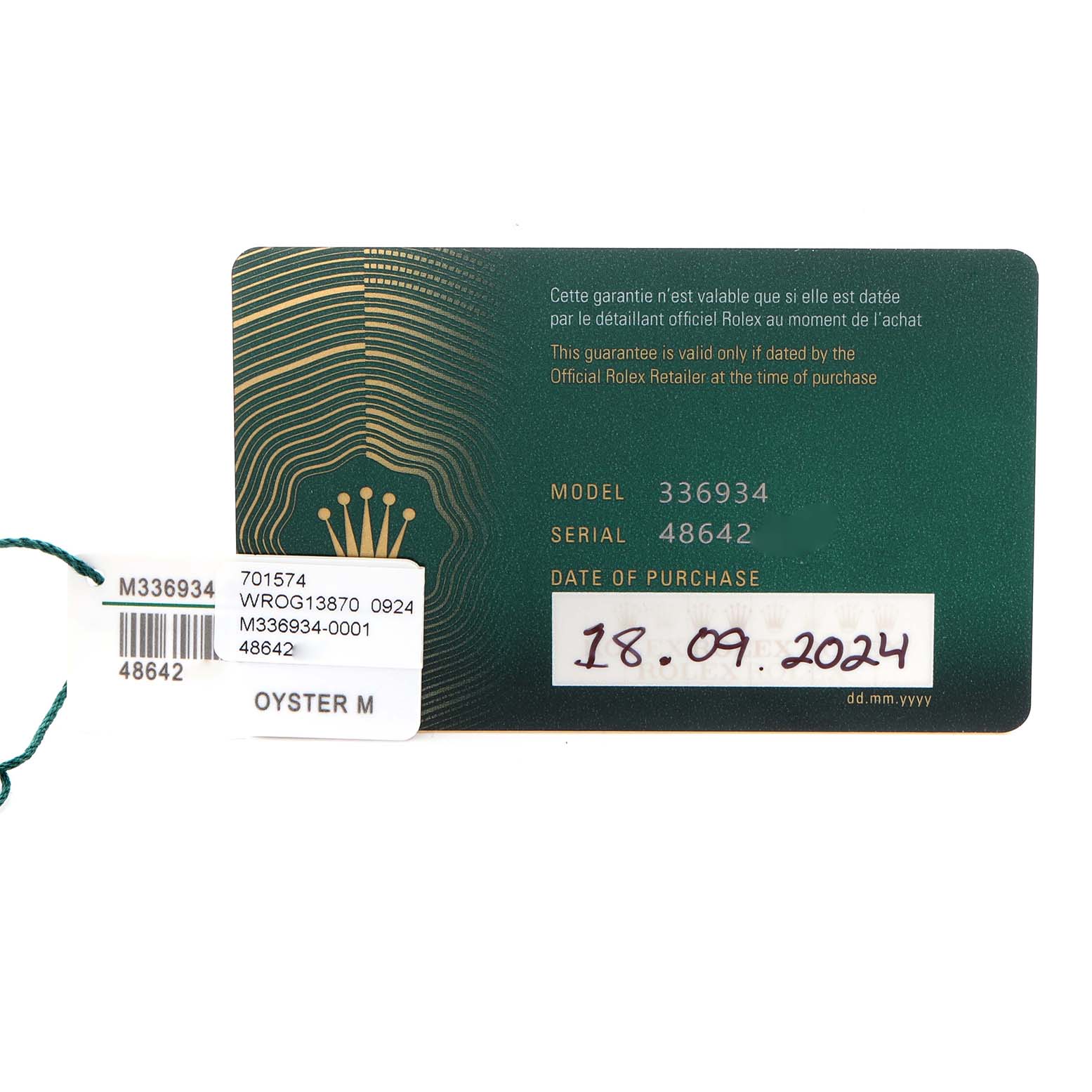 The image shows a warranty card for the Rolex Sky-Dweller 336934 Men's Stainless Steel Green Dial 336934 Men's Stainless Steel Green Dial model, displaying model and serial numbers and purchase date.