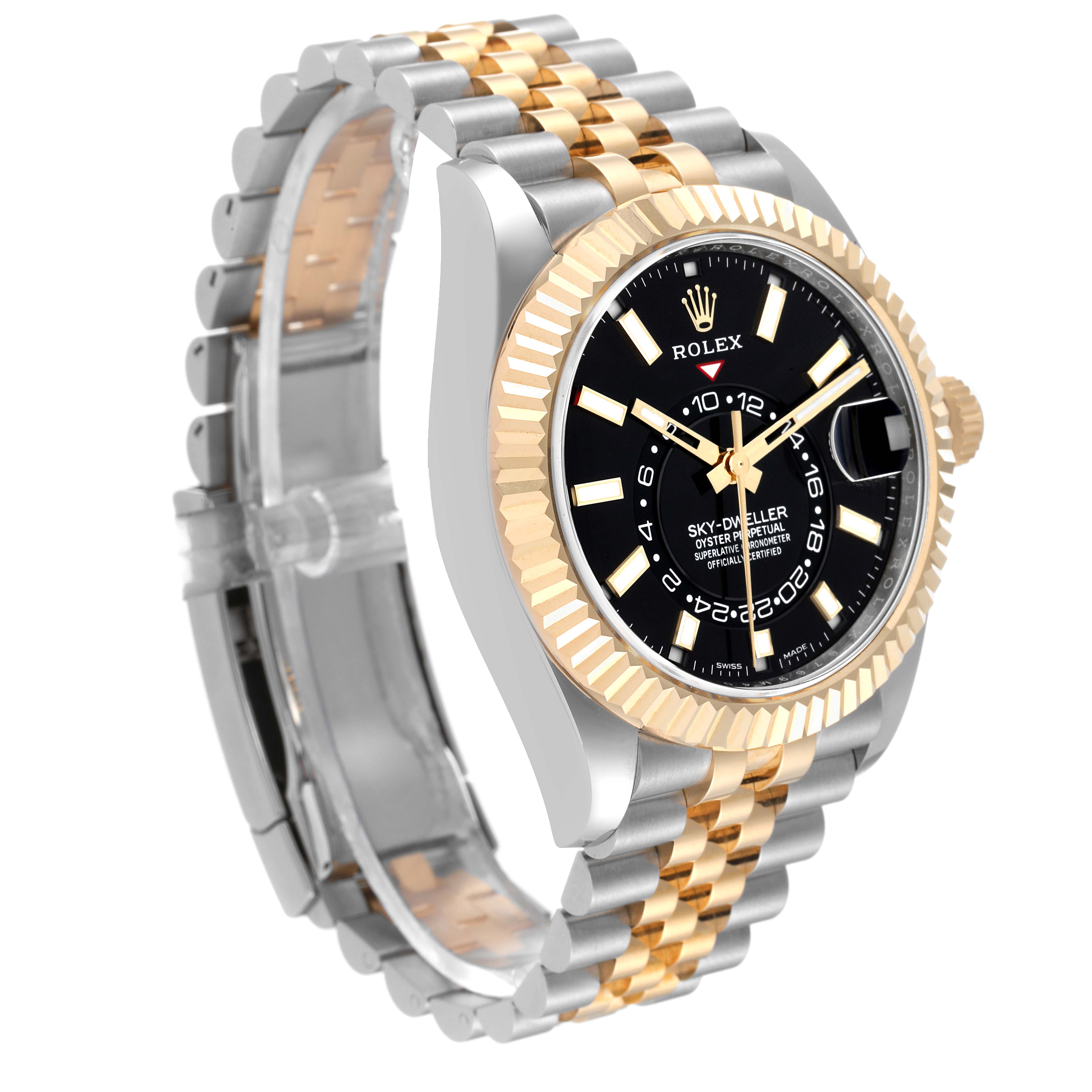 The image shows a side and partial front view of a Rolex Sky-Dweller 326933 Men
s Steel and Gold (two tone) Black Dial 326933 Men
s Steel and Gold (two tone) Black Dial watch, highlighting its black dial, fluted bezel, and two-tone bracelet.