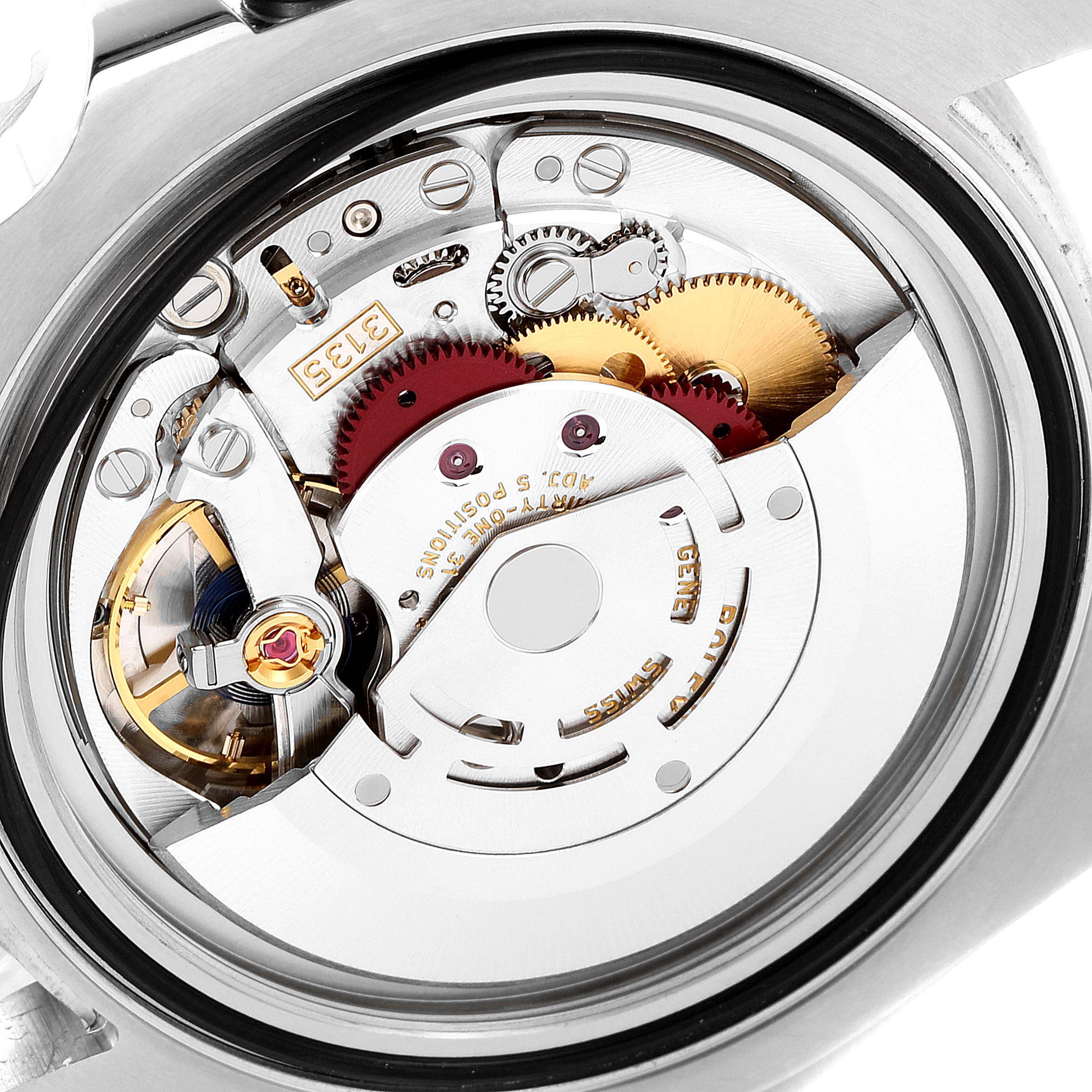 The image shows the internal mechanism and movement of a Rolex Submariner 116610 Men
s Stainless Steel Black Dial 116610 Men
s Stainless Steel Black Dial watch from a rear view.