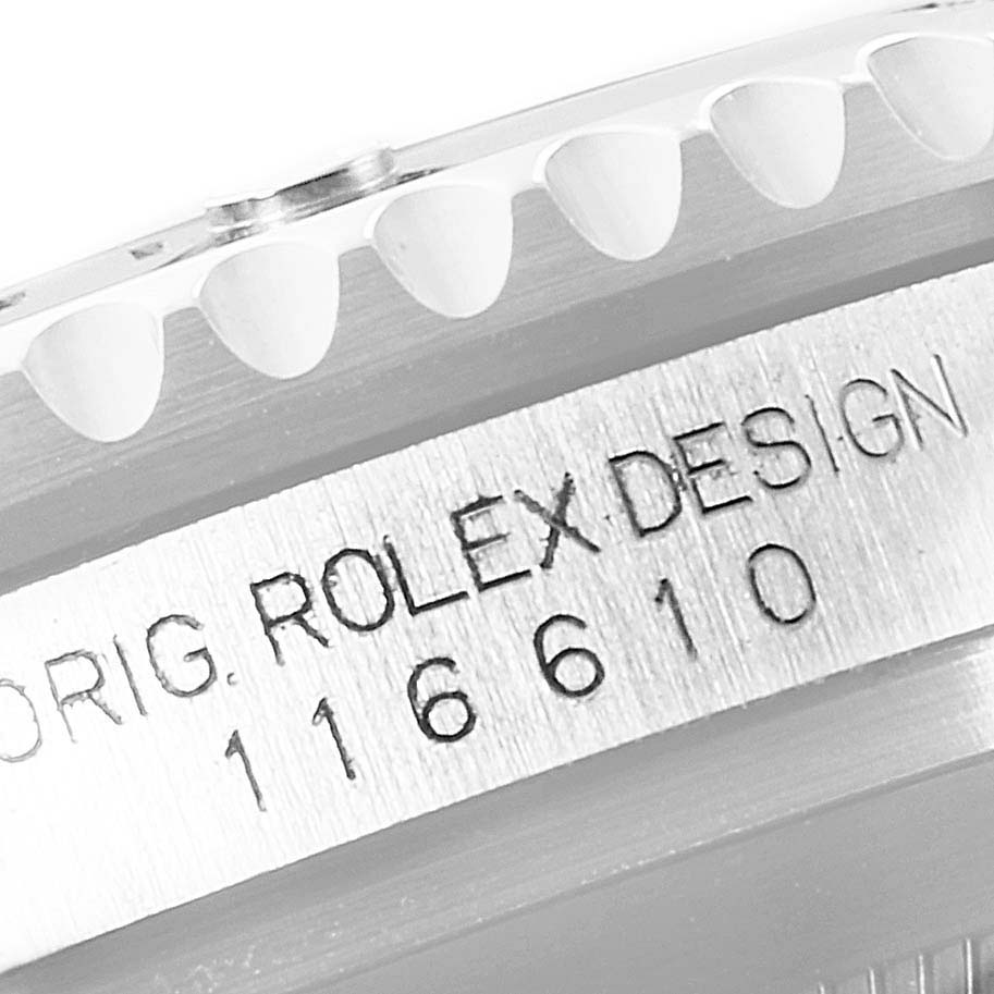 The image shows a close-up of the engraved side of a Rolex Submariner 116610 Men
s Stainless Steel Black Dial 116610 Men
s Stainless Steel Black Dial watch with the model number "116610."