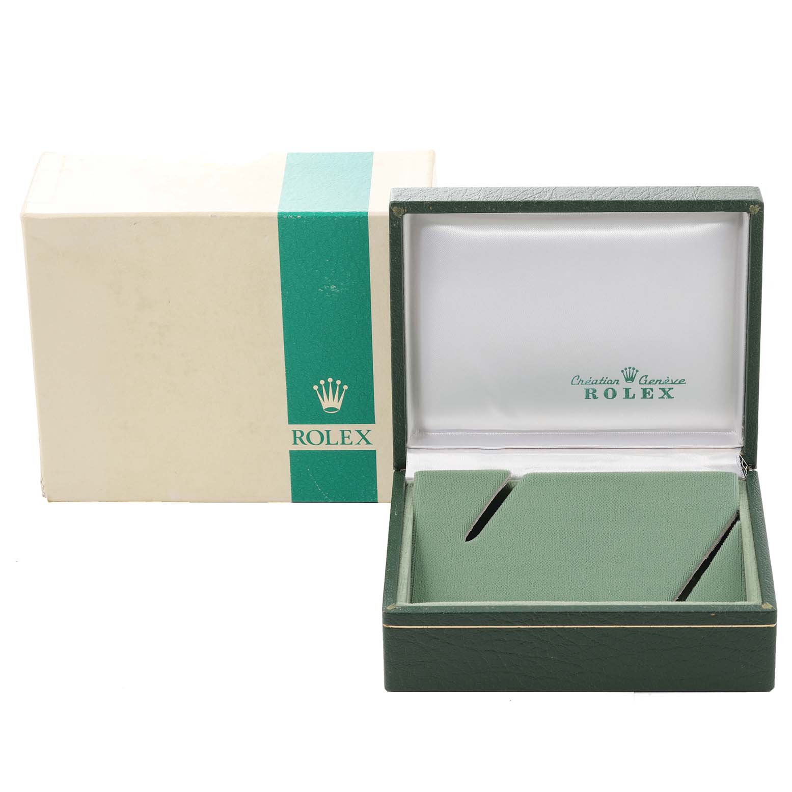 This image shows an open Rolex Submariner 5513 Men
s Stainless Steel Black Dial 5513 Men
s Stainless Steel Black Dial watch box with its green and white outer packaging.