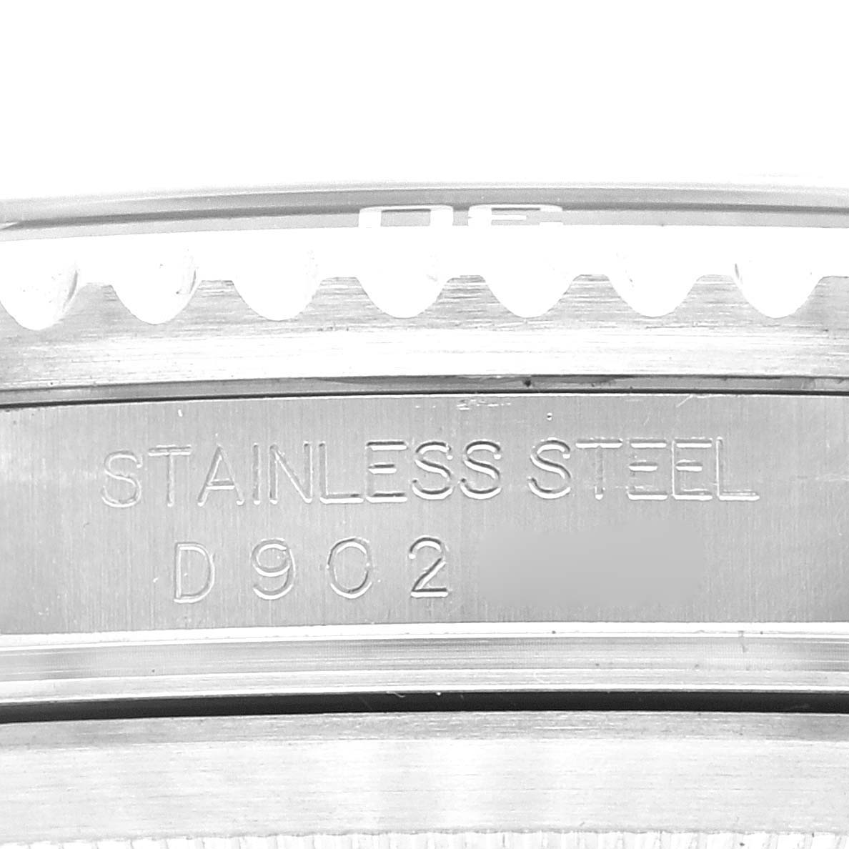 This image shows a close-up of the side engraving on the stainless steel case of a Rolex Submariner 16610 Men's Stainless Steel Black Dial 16610 Men's Stainless Steel Black Dial watch.