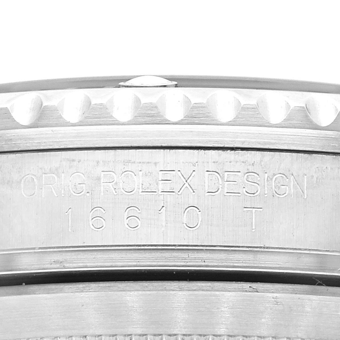 This close-up image shows the side engraving and edge of the bezel of a Rolex Submariner 16610LV Men
s Stainless Steel Black Dial 16610LV Men
s Stainless Steel Black Dial model.