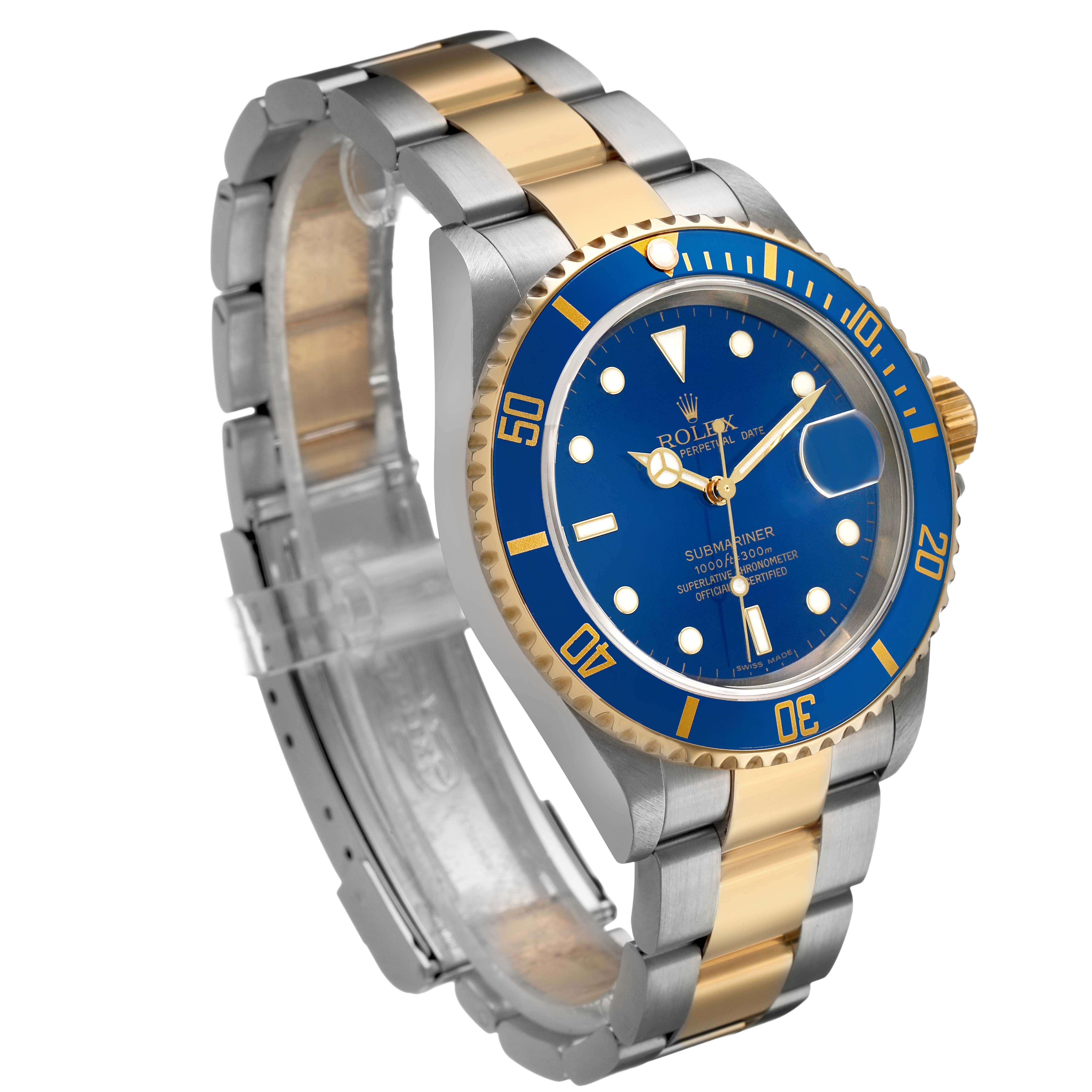 The Rolex Submariner 16613 Men's Steel and Gold (two tone) Blue Dial watch is shown at an angle highlighting the blue dial, bezel, and two-tone bracelet.