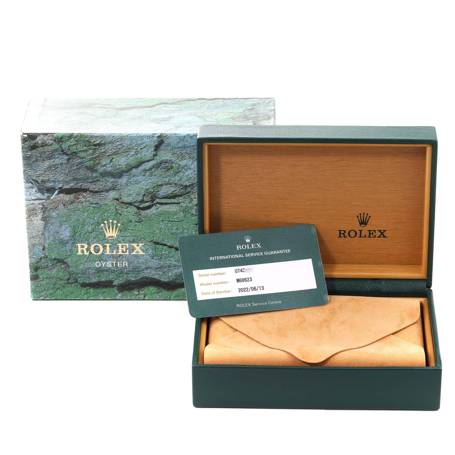 The image shows a Rolex Yacht-Master 68623 Men
s Steel and Gold (two tone) White Dial 68623 Men
s Steel and Gold (two tone) White Dial box, certificate, and watch pouch in a front-facing angle.