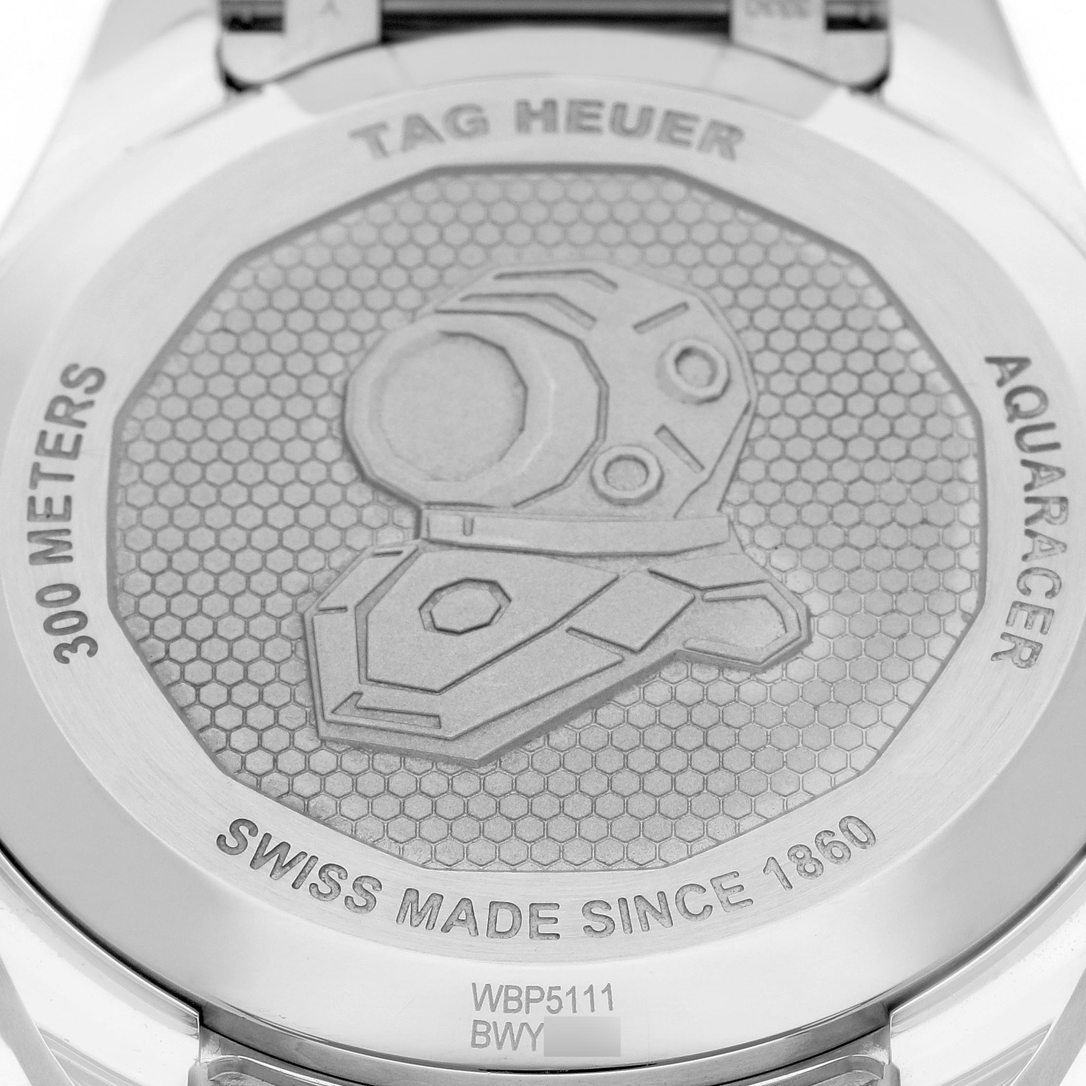 The image shows the case back of a Tag Heuer Aquaracer WBP5111.BA0013 Men's Stainless Steel Blue Dial WBP5111.BA0013 Men's Stainless Steel Blue Dial watch, displaying engravings and branding details.