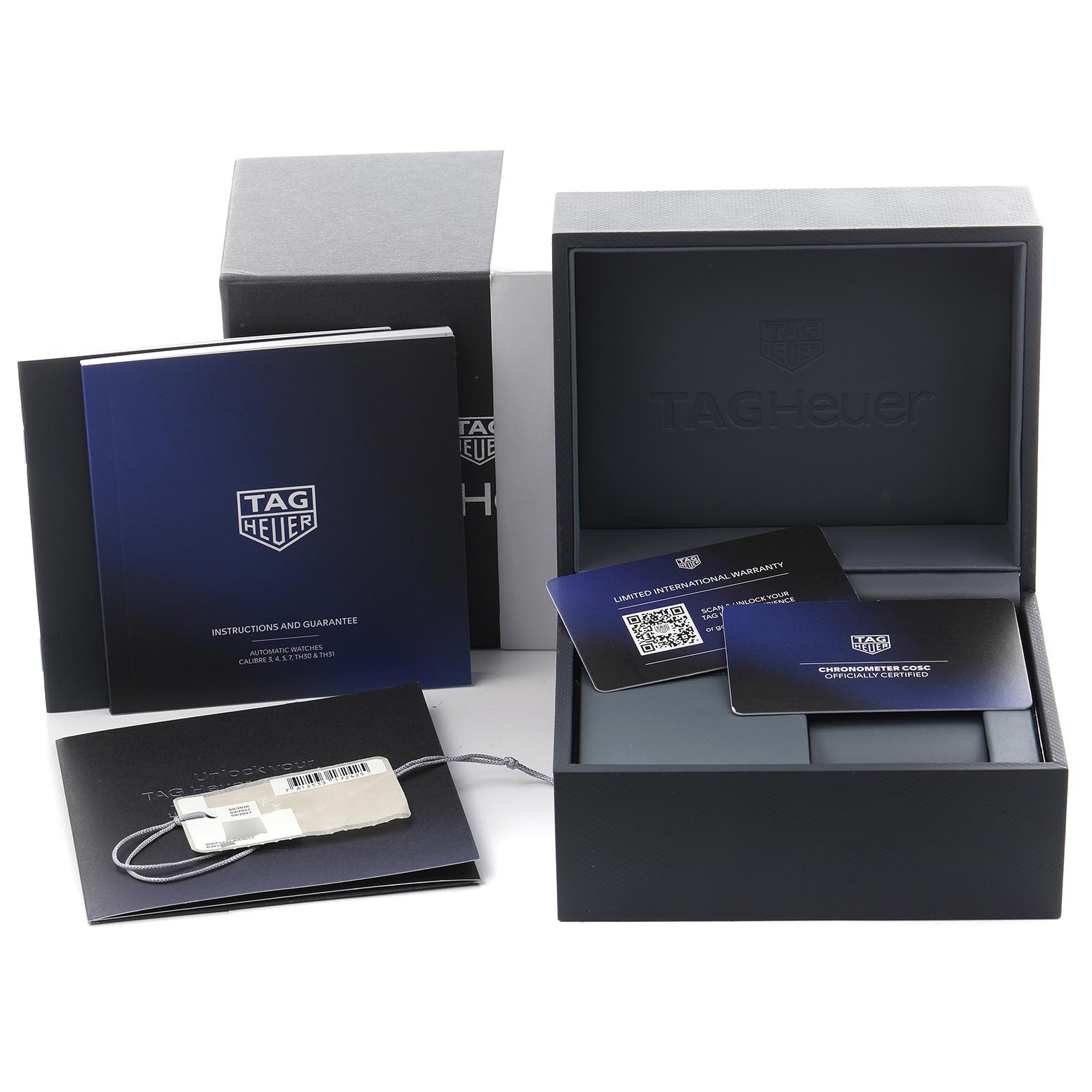 The image shows Tag Heuer Aquaracer WBP5111.BA0013 Men's Stainless Steel Blue Dial WBP5111.BA0013 Men's Stainless Steel Blue Dial accessories, including the box, warranty card, and instruction booklet from a front angle.