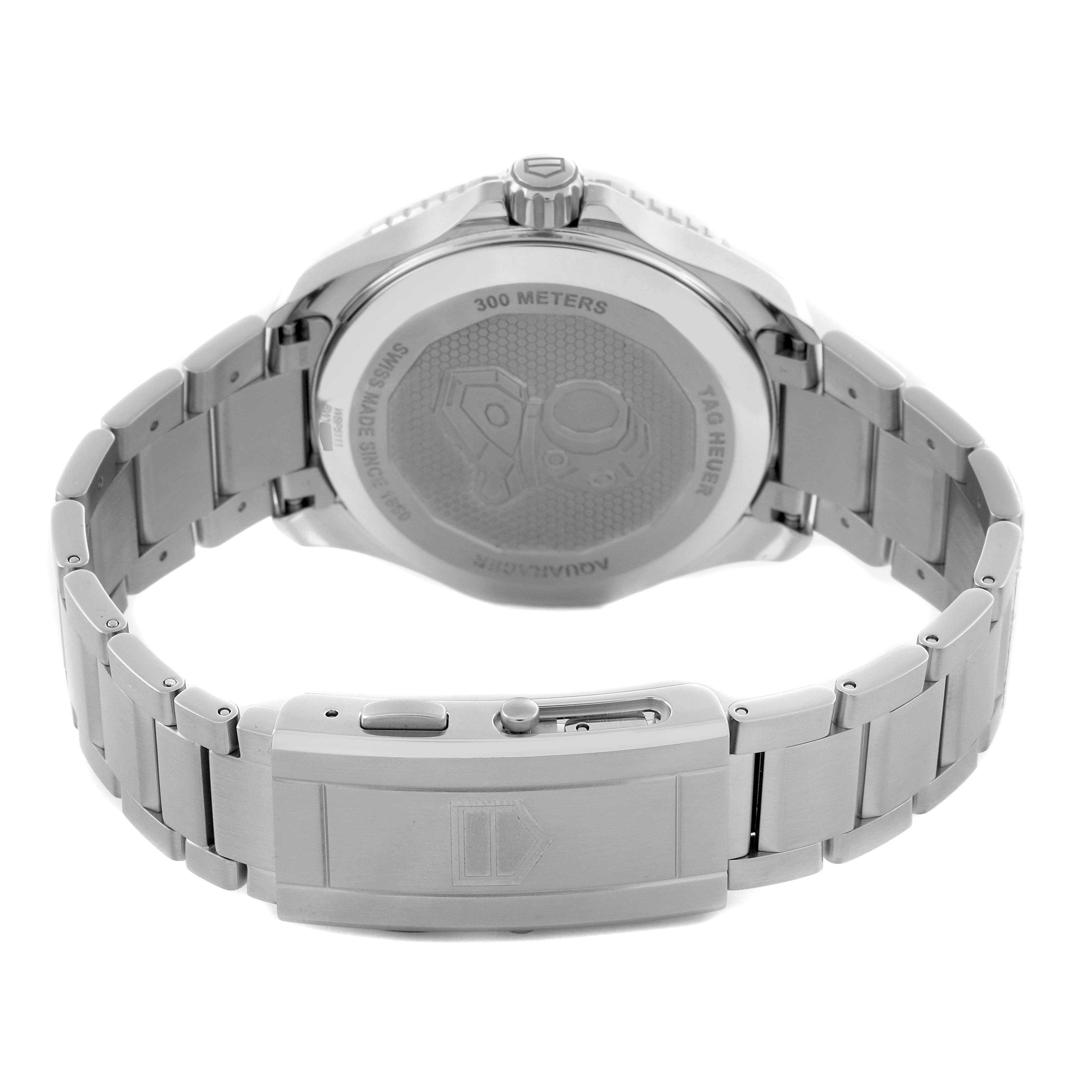 The Tag Heuer Aquaracer WBP5111.BA0013 Men's Stainless Steel Blue Dial WBP5111.BA0013 Men's Stainless Steel Blue Dial watch is shown from a rear angle, highlighting the case back and metal bracelet clasp.