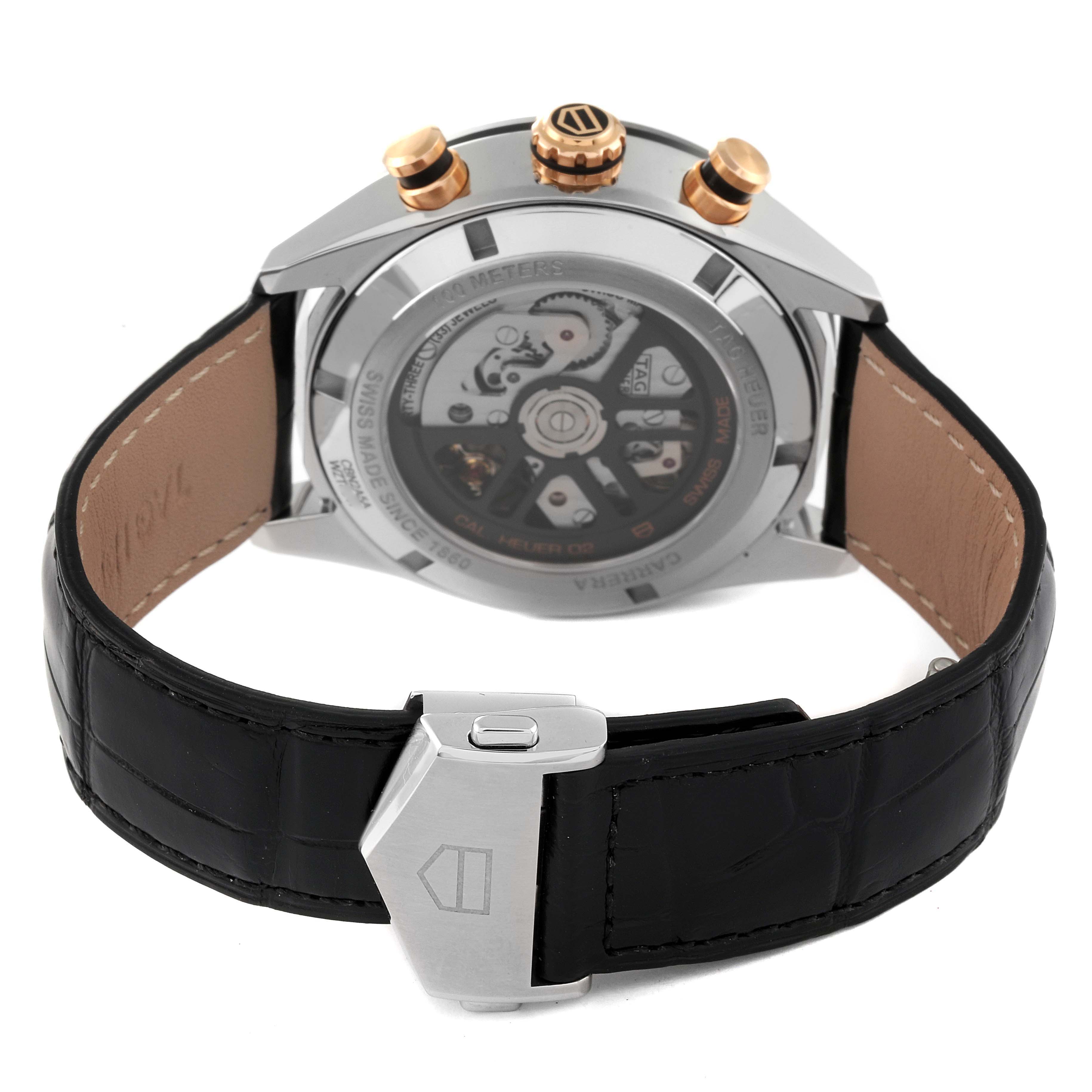 The image shows the back view of a Tag Heuer Carrera CBN2A5A.FC6481 Men
s Steel and Gold (two tone) Black Dial CBN2A5A.FC6481 Men
s Steel and Gold (two tone) Black Dial watch, highlighting the movement, case back, and leather strap.