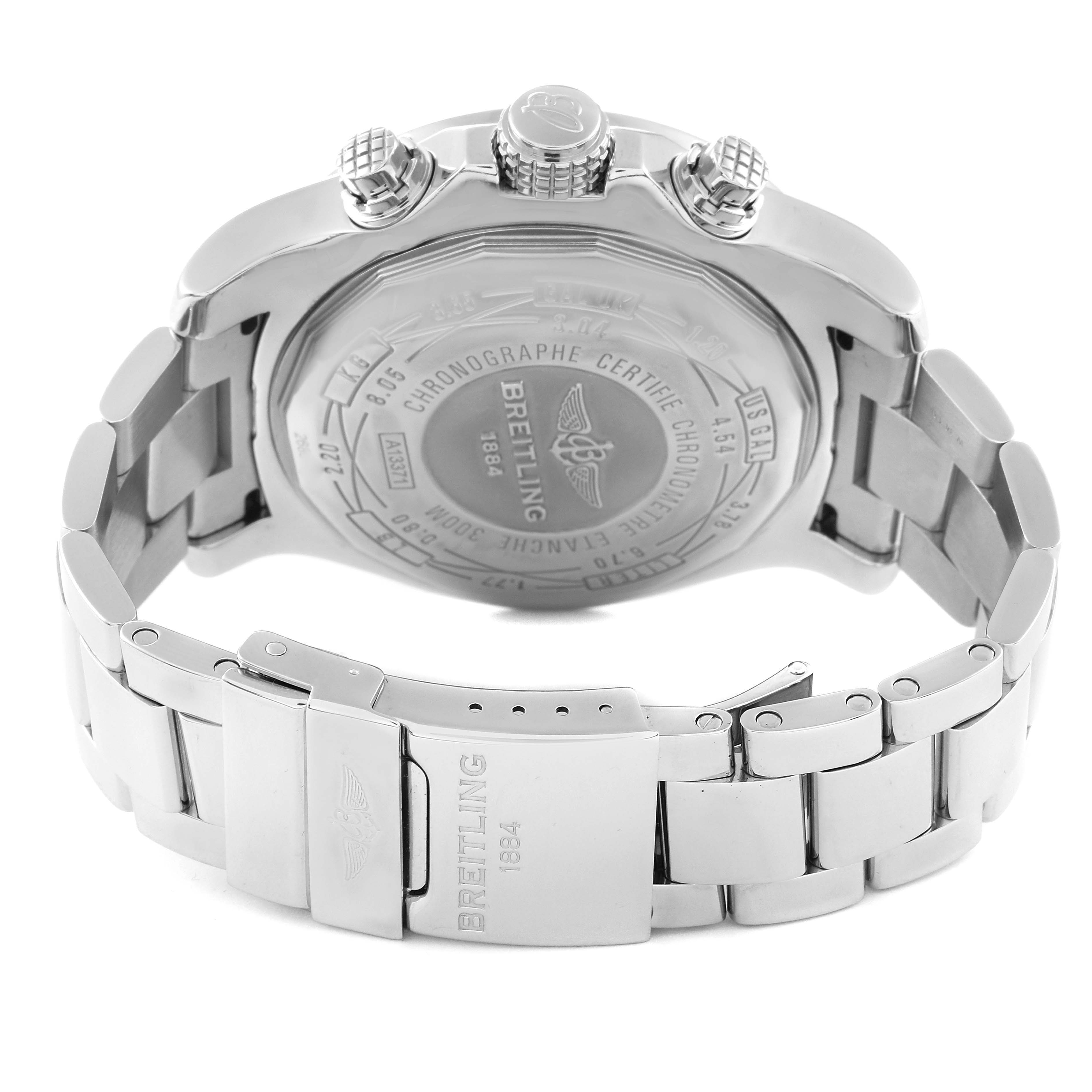 The image shows the back case and clasp of a Breitling Avenger A13371 Men's Stainless Steel Black Dial A13371 Men's Stainless Steel Black Dial watch from an angle highlighting its bracelet and engraved details.