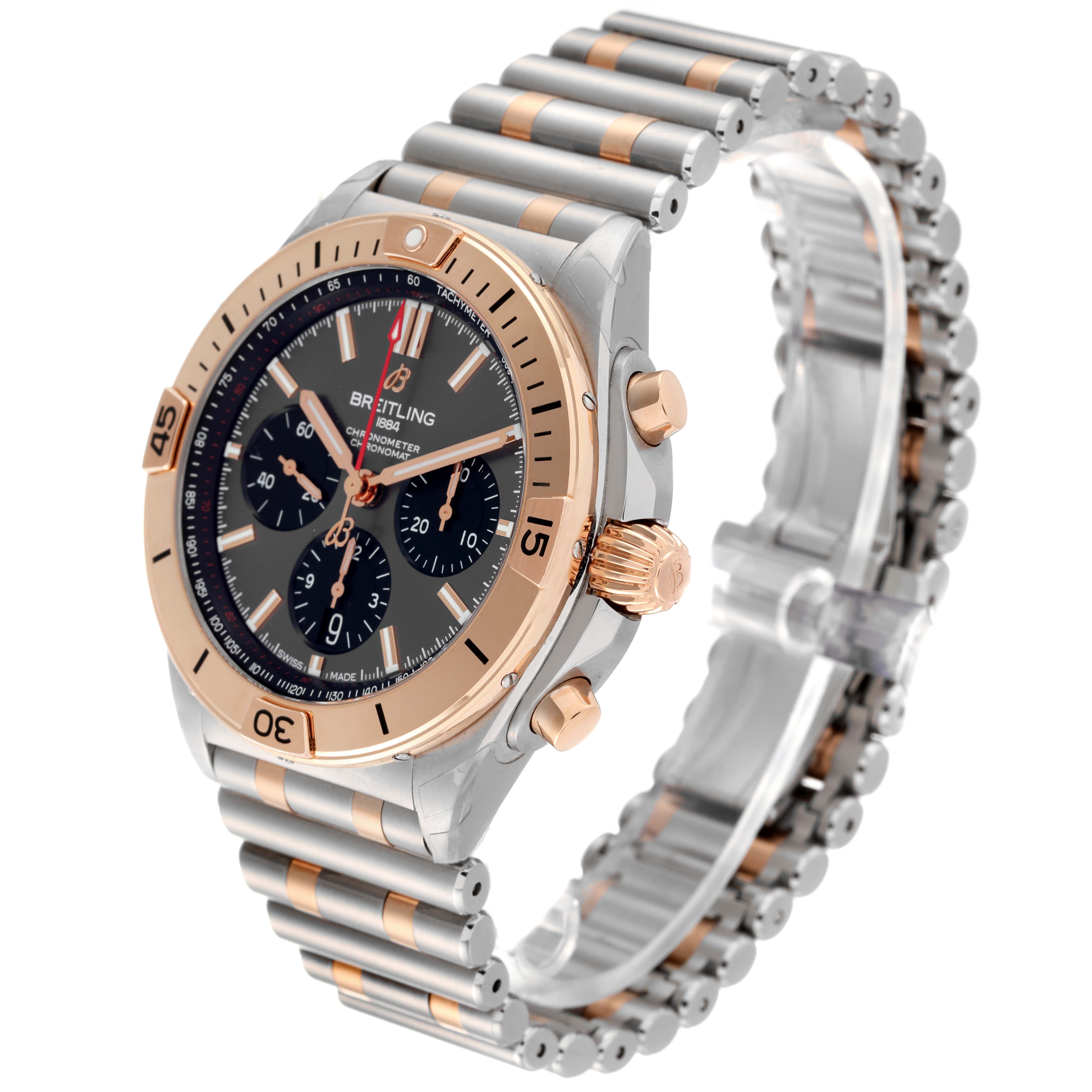 The Breitling Chronomat UB0134 Men's Steel and Gold (two tone) Grey Dial UB0134 Men's Steel and Gold (two tone) Grey Dial watch is shown at an angled side view, displaying its bezel, dial, crown, and bracelet.