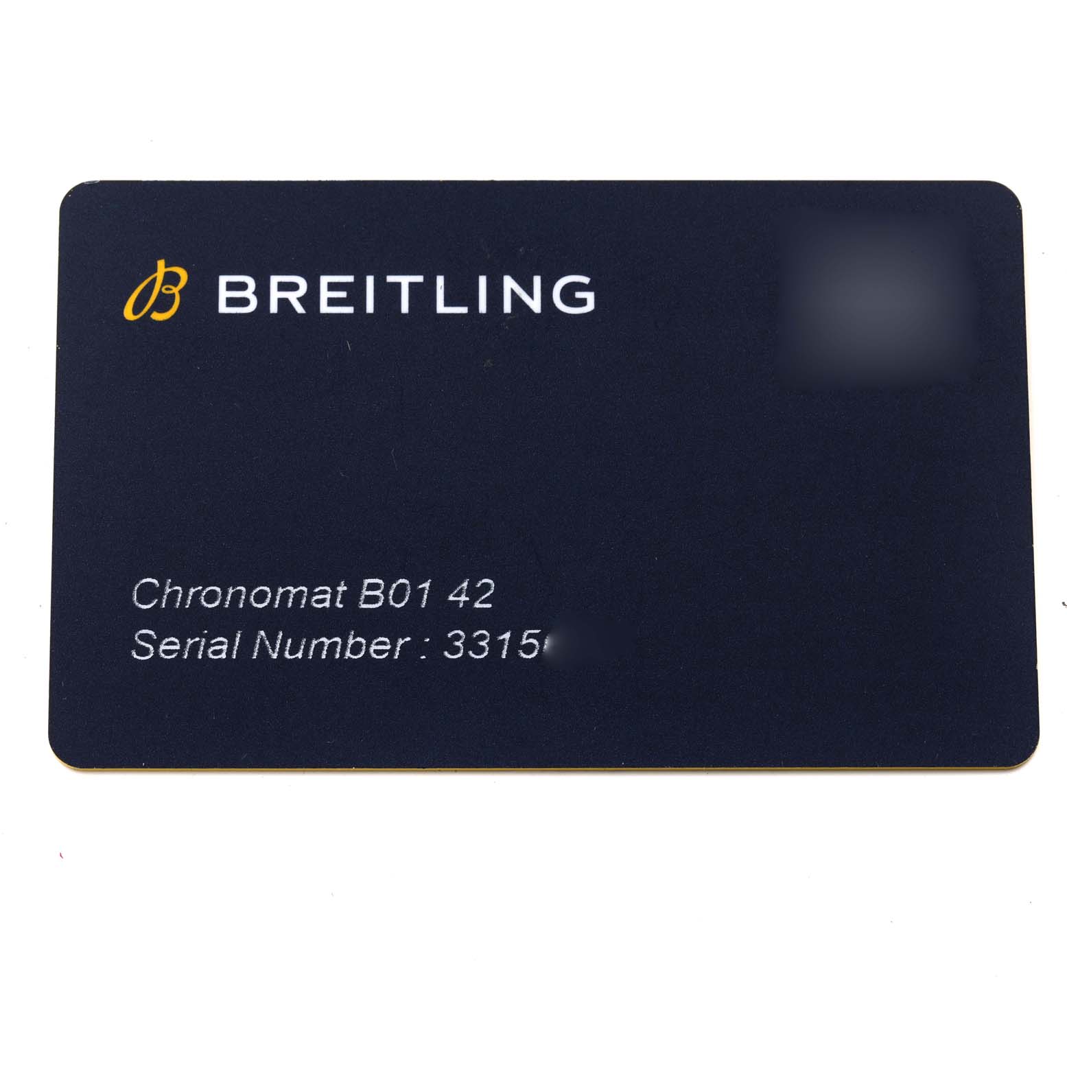 The image shows the serial number card for the Breitling Chronomat UB0134 Men's Steel and Gold (two tone) Grey Dial UB0134 Men's Steel and Gold (two tone) Grey Dial B01 42 watch model.