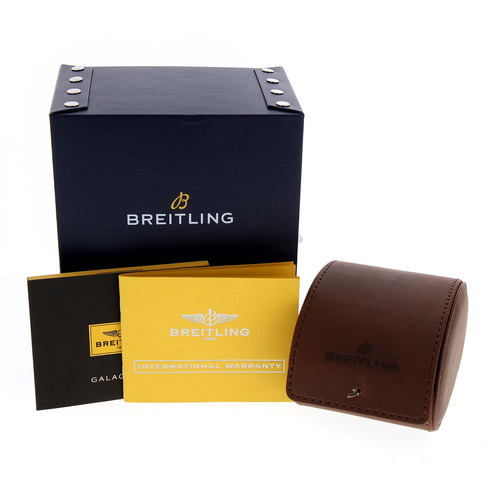 This image shows the box, warranty booklet, and brown leather travel case for the Breitling H72348 Women's Rose Gold Black Dial H72348 Women's Rose Gold Black Dial Galactic 29 18k Rose Gold Diamond Dial Ladies Watch H72348.