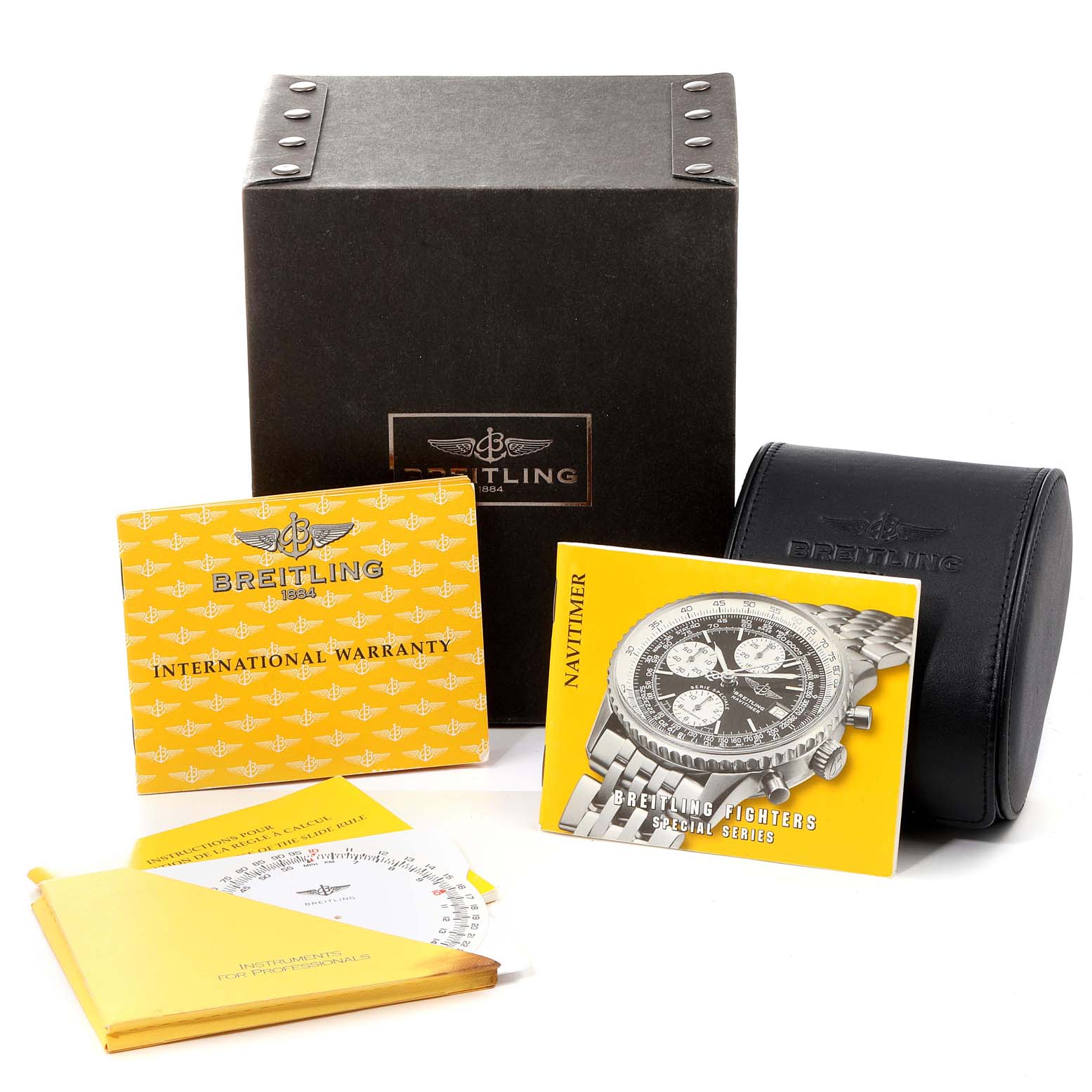 This image shows a Breitling Navitimer A13330 Men
s Stainless Steel Black Dial A13330 Men
s Stainless Steel Black Dial watch box, international warranty, instruction manuals, and a black leather case.