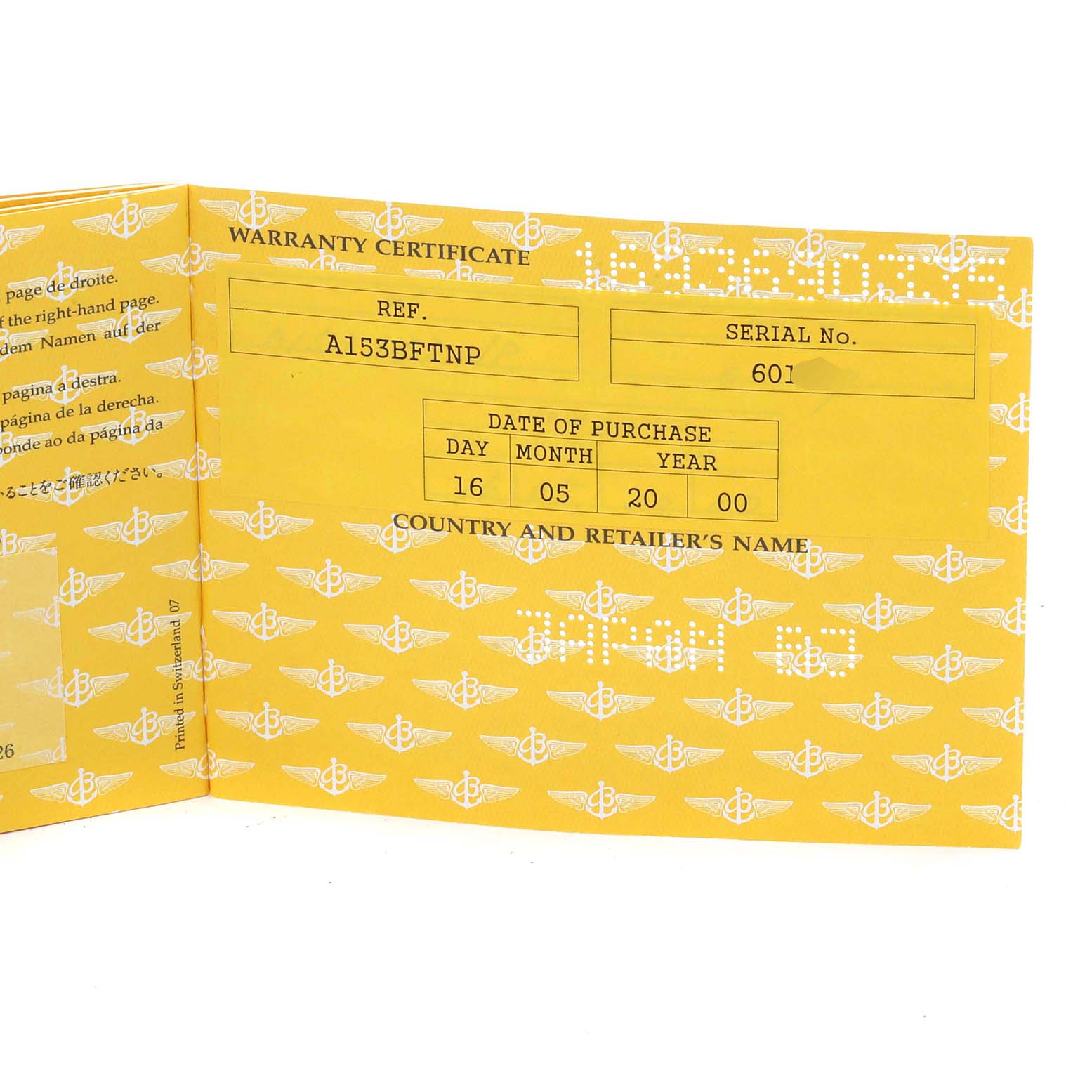 The image shows the inside of a warranty certificate for a Breitling Navitimer A13330 Men
s Stainless Steel Black Dial A13330 Men
s Stainless Steel Black Dial watch.