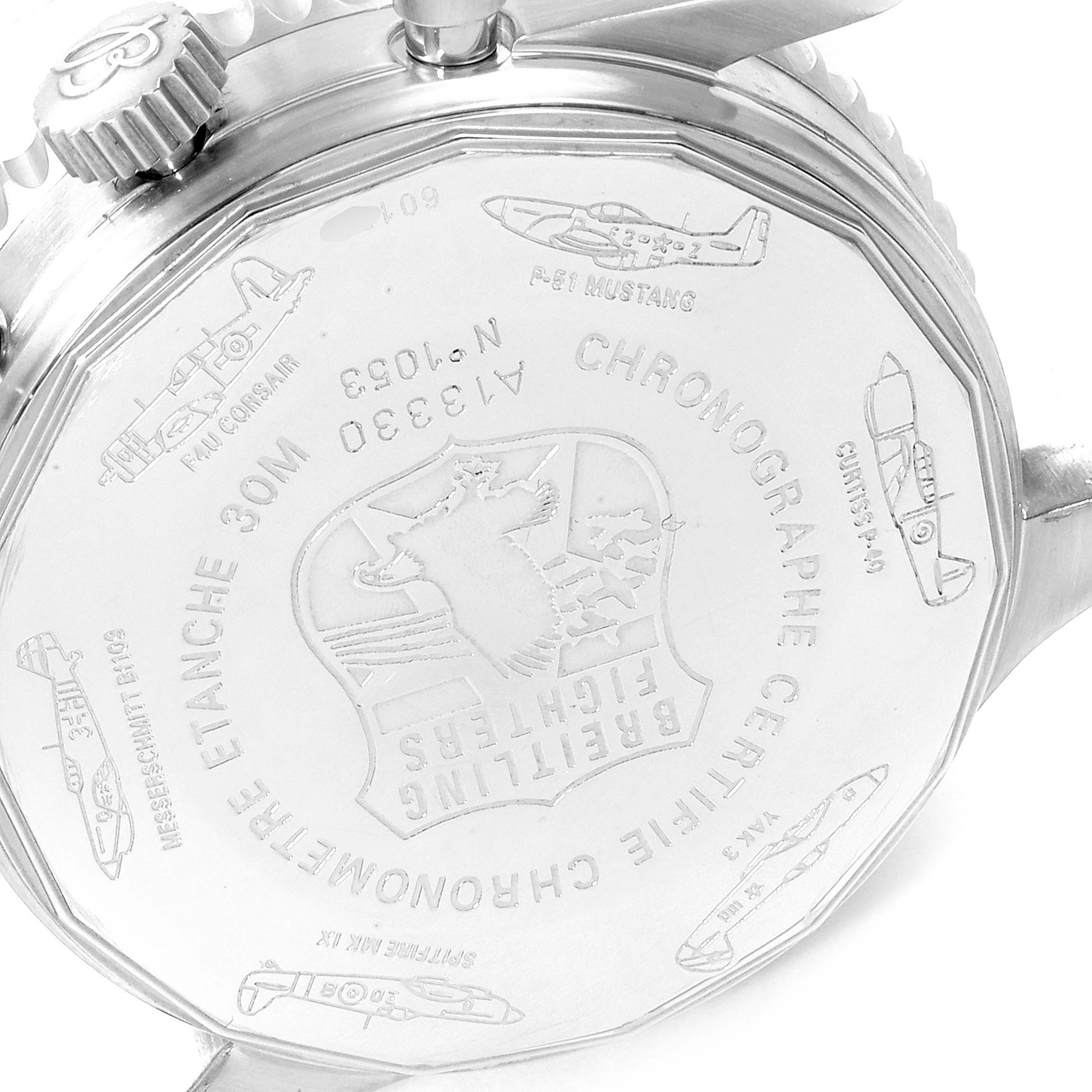 The image shows the back case of a Breitling Navitimer A13330 Men
s Stainless Steel Black Dial A13330 Men
s Stainless Steel Black Dial watch, featuring engraved aircraft designs and brand details.