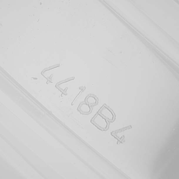 The image shows an engraved serial number on the surface of a Breitling Premier AB0118A61C1A1 Men's Stainless Steel Blue Dial accessory.