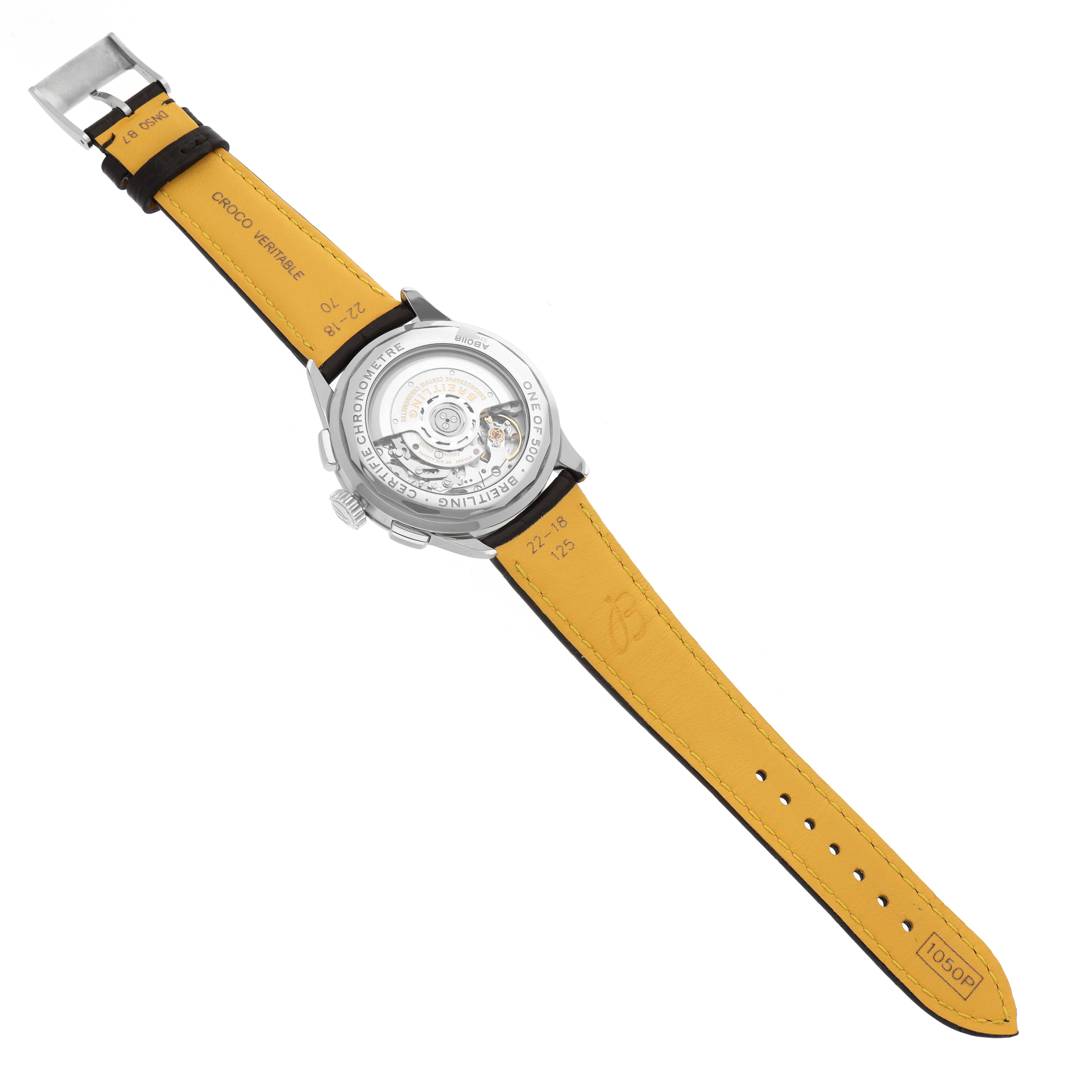 The image shows the back view of a Breitling Premier AB0118A31B1X1 Men
s Stainless Steel Grey Dial AB0118A31B1X1 Men
s Stainless Steel Grey Dial watch, highlighting the movement mechanism and yellow leather strap.