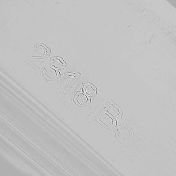 The image shows a close-up of the serial number engraved on the side of a Breitling Superocean A17365 Men's Stainless Steel Black Dial watch.